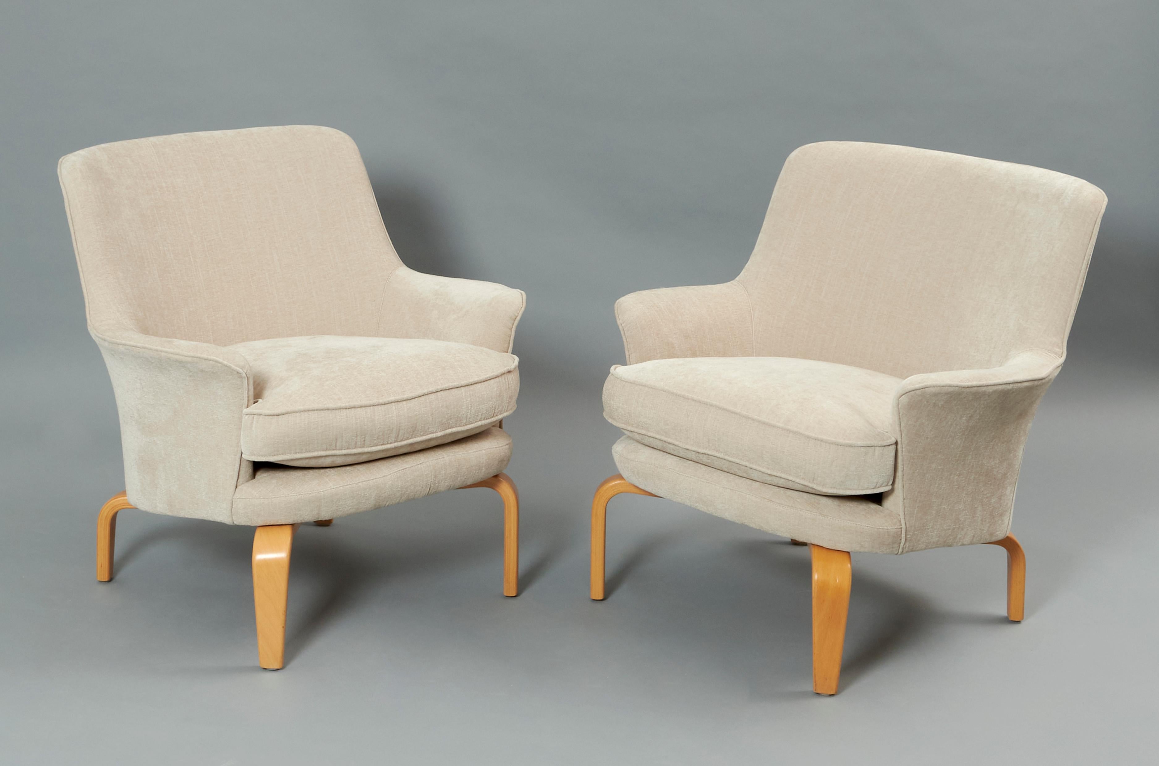 Pair of ‘’Pilot’’ armchairs in beech and upholstery designed by Arne Norell for Norell möbel AB. Sweden 1960s 
Excellent restored and reupholstered condition that might present slight traces of use. 
Arne Norell was a Swedish designer founder of