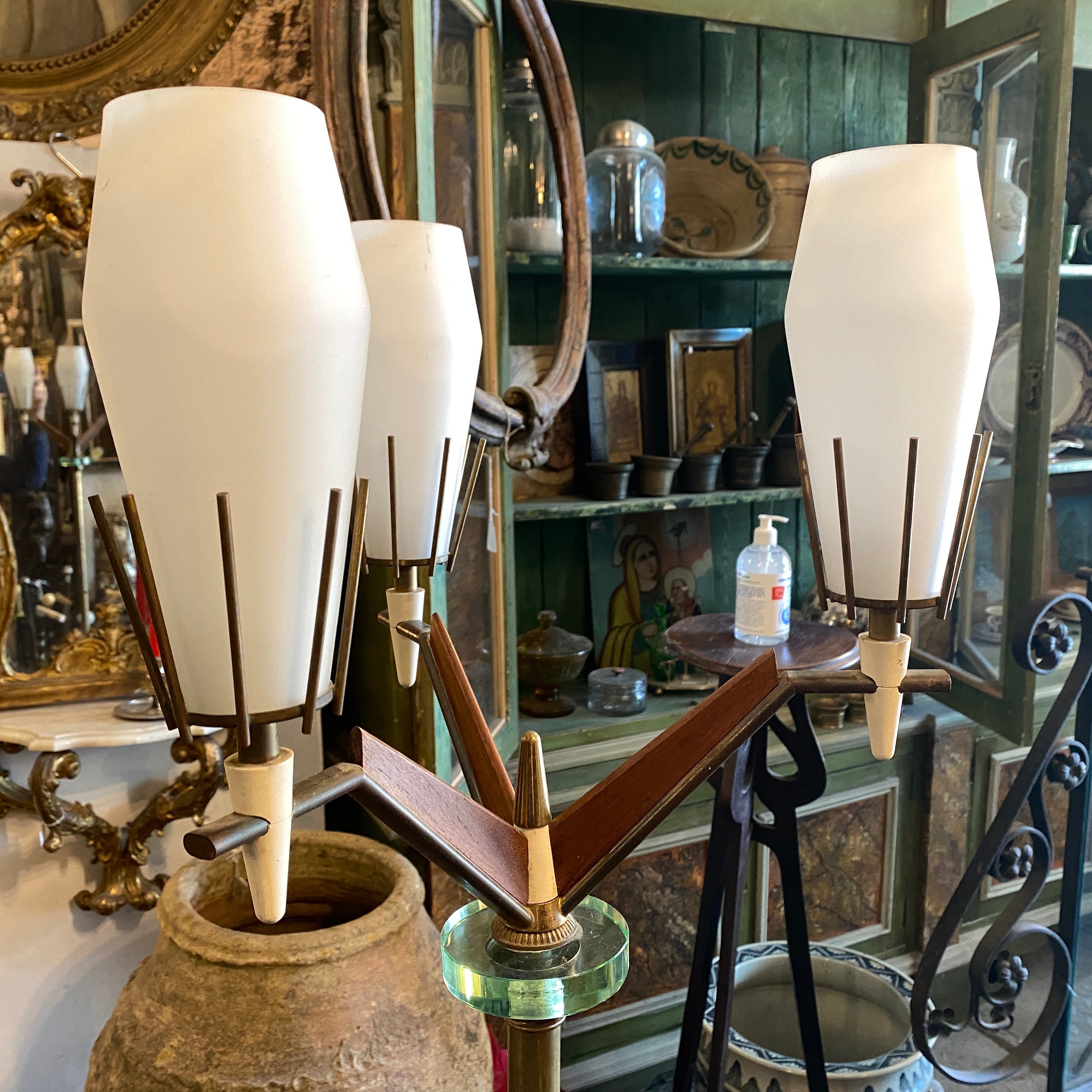 A rare three lights floor lamp designed and manufactured in Italy in the sixties by Arredoluce, Three lights diffusors are in white opaline glass, structure it's in brass with a round marble base, in the middle there is a round part in verde nilo