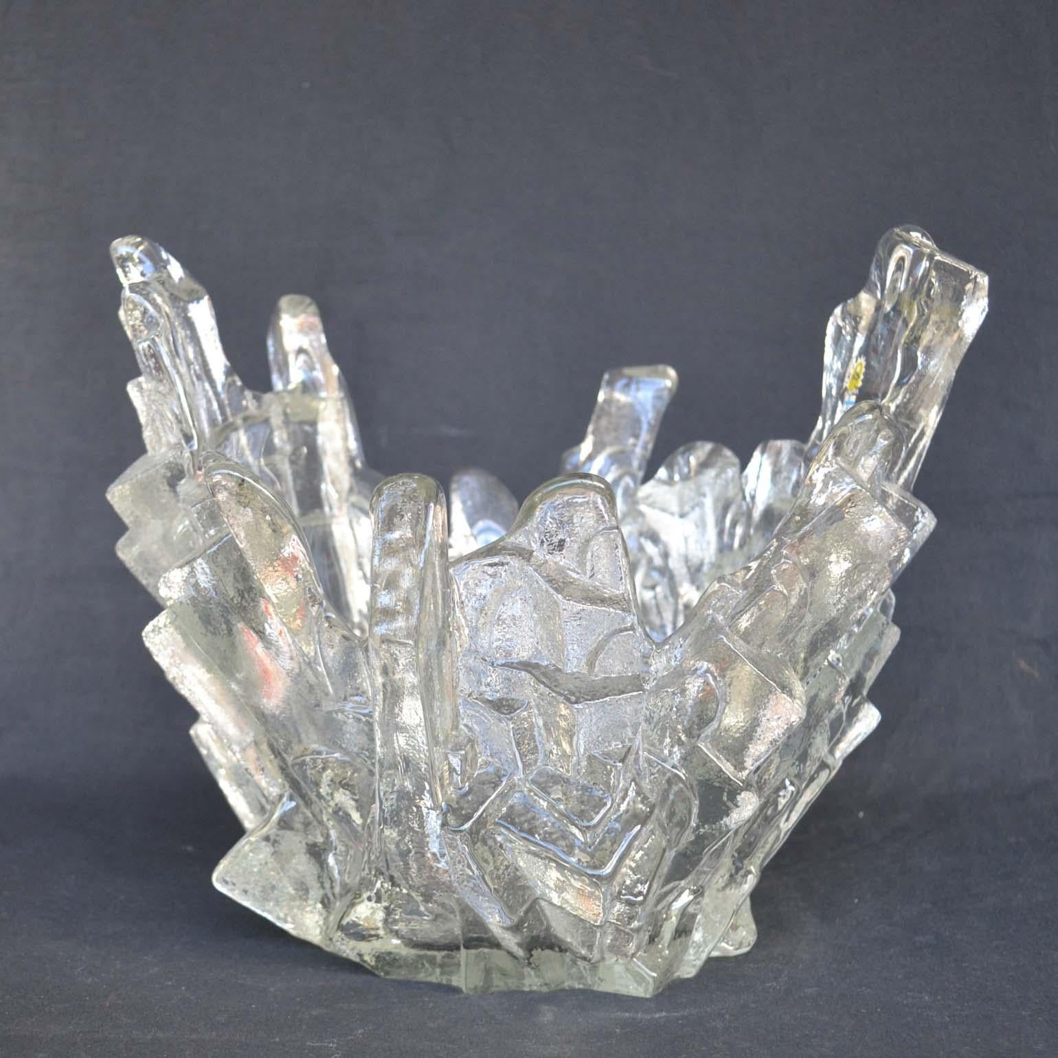 Decorative clear crystal glass bowl like ice rocks by Humppila Finland, hand signed underneath and marked with label inside.
Humppila Glass was founded in Finland in 1952 and designed by Pertti Santalahti in the 1970's.