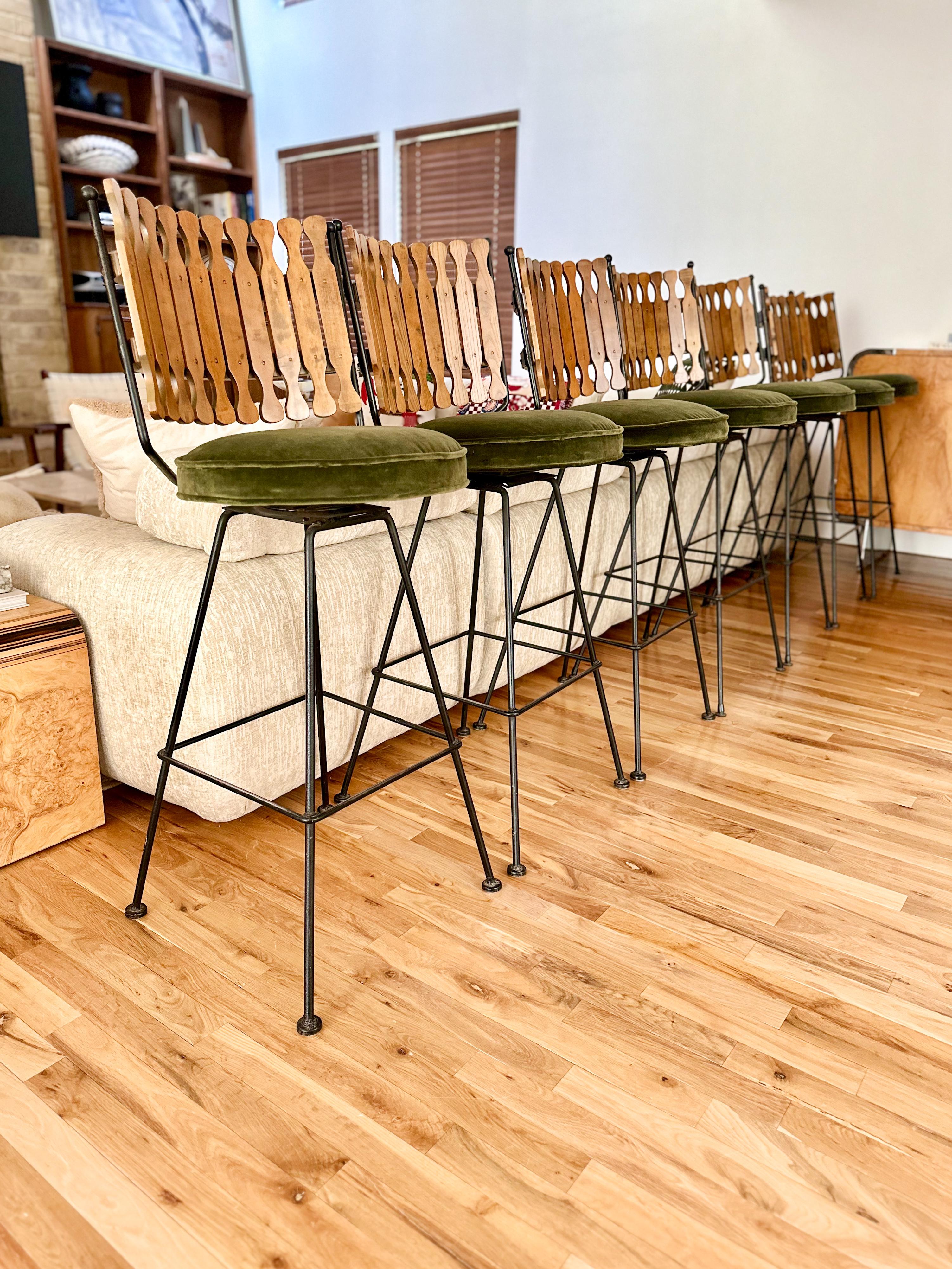 Arthur Umanoff for Shaver Howard bar stools, c.1960s. We love the contrasting yet perfectly complementary materials on these: iron frames, walnut stained birched backs, and olive velvet seats. Sixty years young and made to last many more decades,