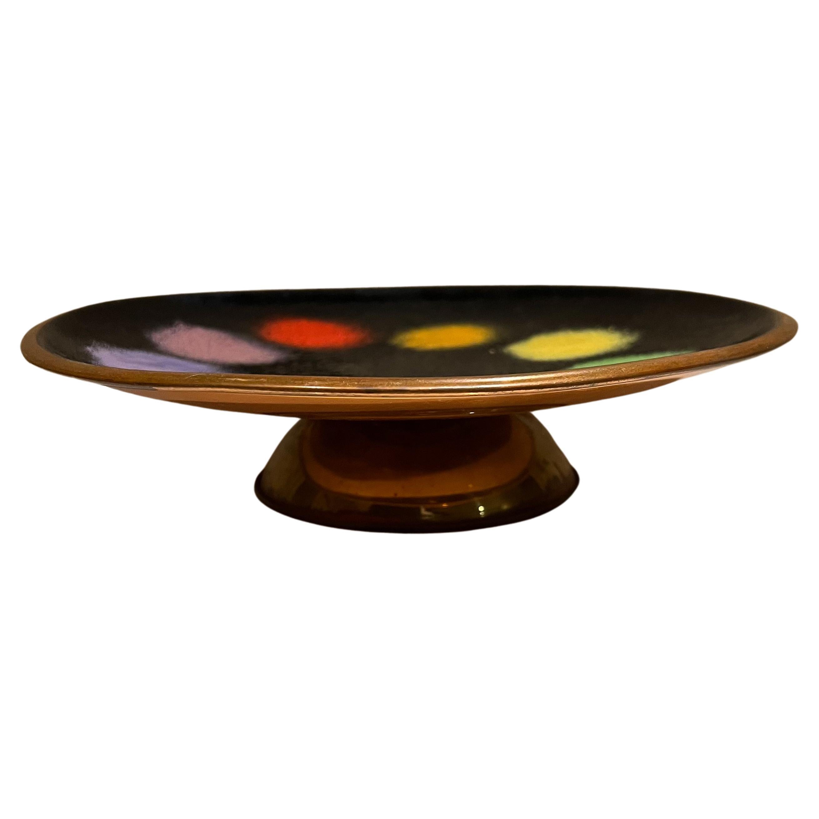 Serving platter
Handmade by Artisware Copper Ceramics Decorative Platter colorful enamel Serving Tray made in England
2.5 tall x 10 diameter
Preowned original unrestored vintage condition.
See images provided.
 