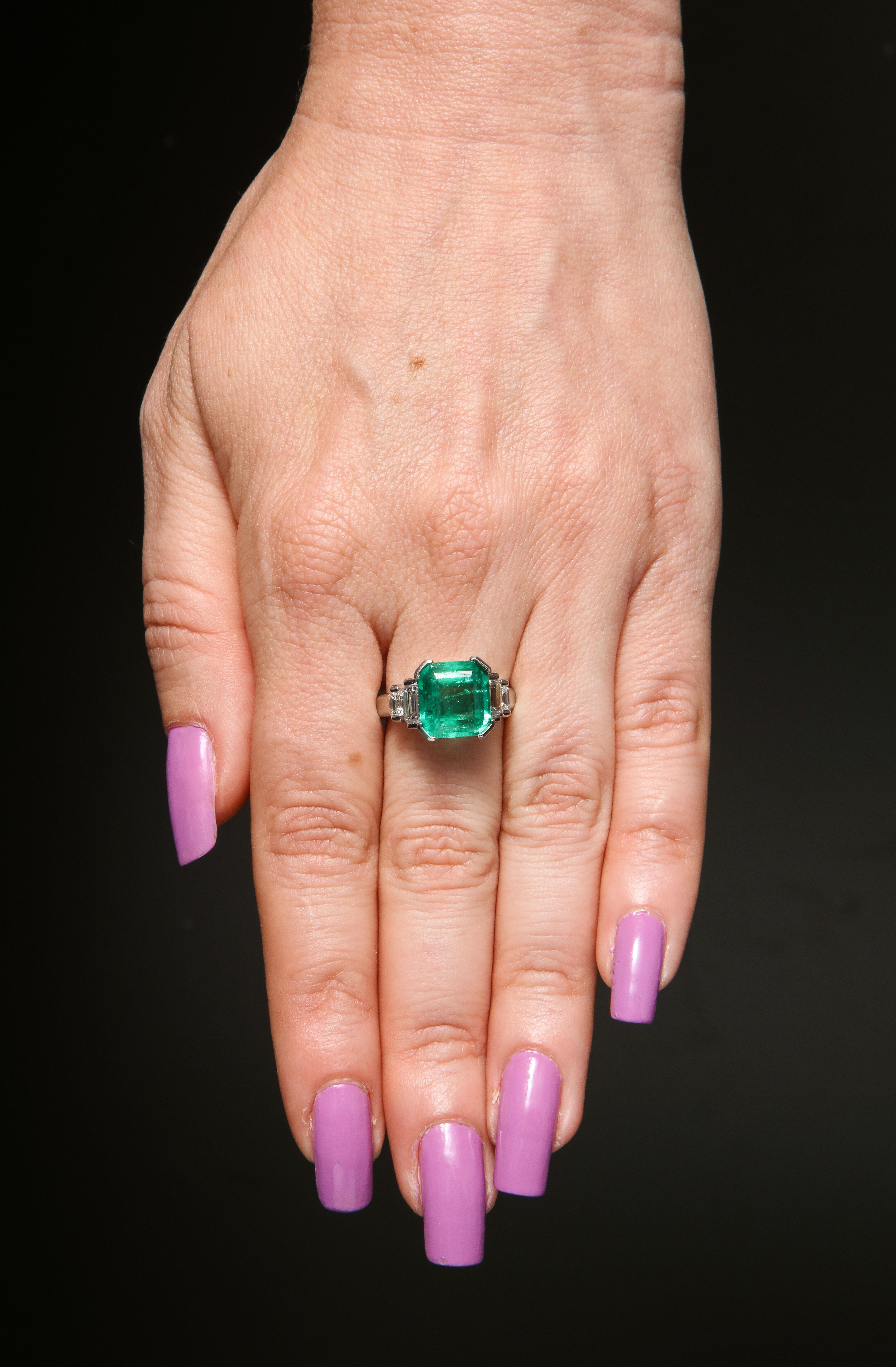 1960's Asscher Cut Emerald with Stepdown Baguette Mounting Platinum Ring In Good Condition In New York, NY