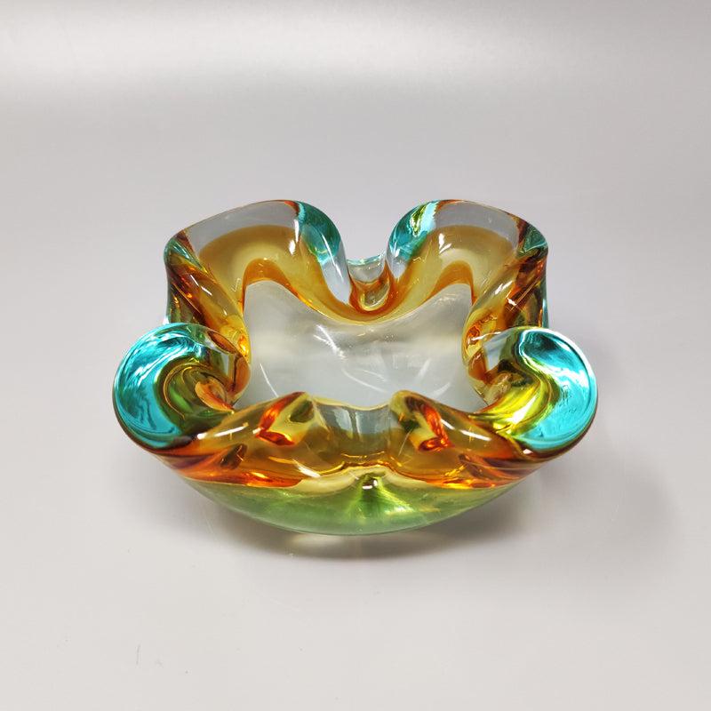 Astonishing ashtray/catchall by Flavio Poli in Murano sommerso glass. Made in italy
The item is in excellent condition.
Dimensions:
diameter 5,11