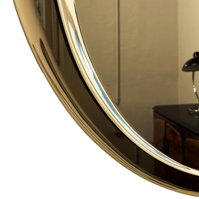 1960s Asymmetric Beveled Mirror with a Beveled Bronze Mirror Frame
