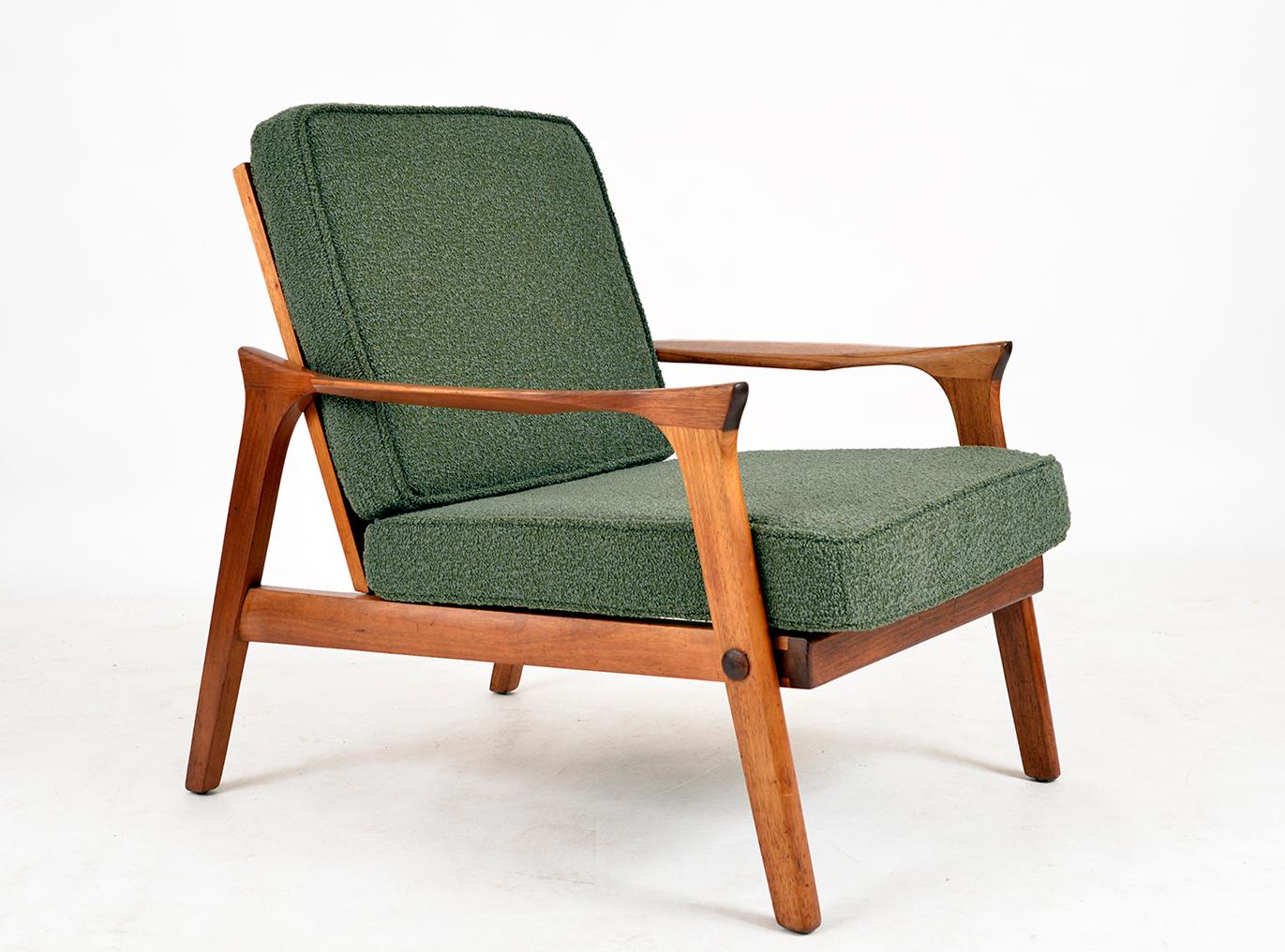 A very nice example of the classic Danish Deluxe “Inga” armchair, produced in Melbourne, Australia in 1963. The frame, made from Tasmanian blackwood, has great angles, beautiful detailing and wide sculpted armrests. 
The chair retains its springs
