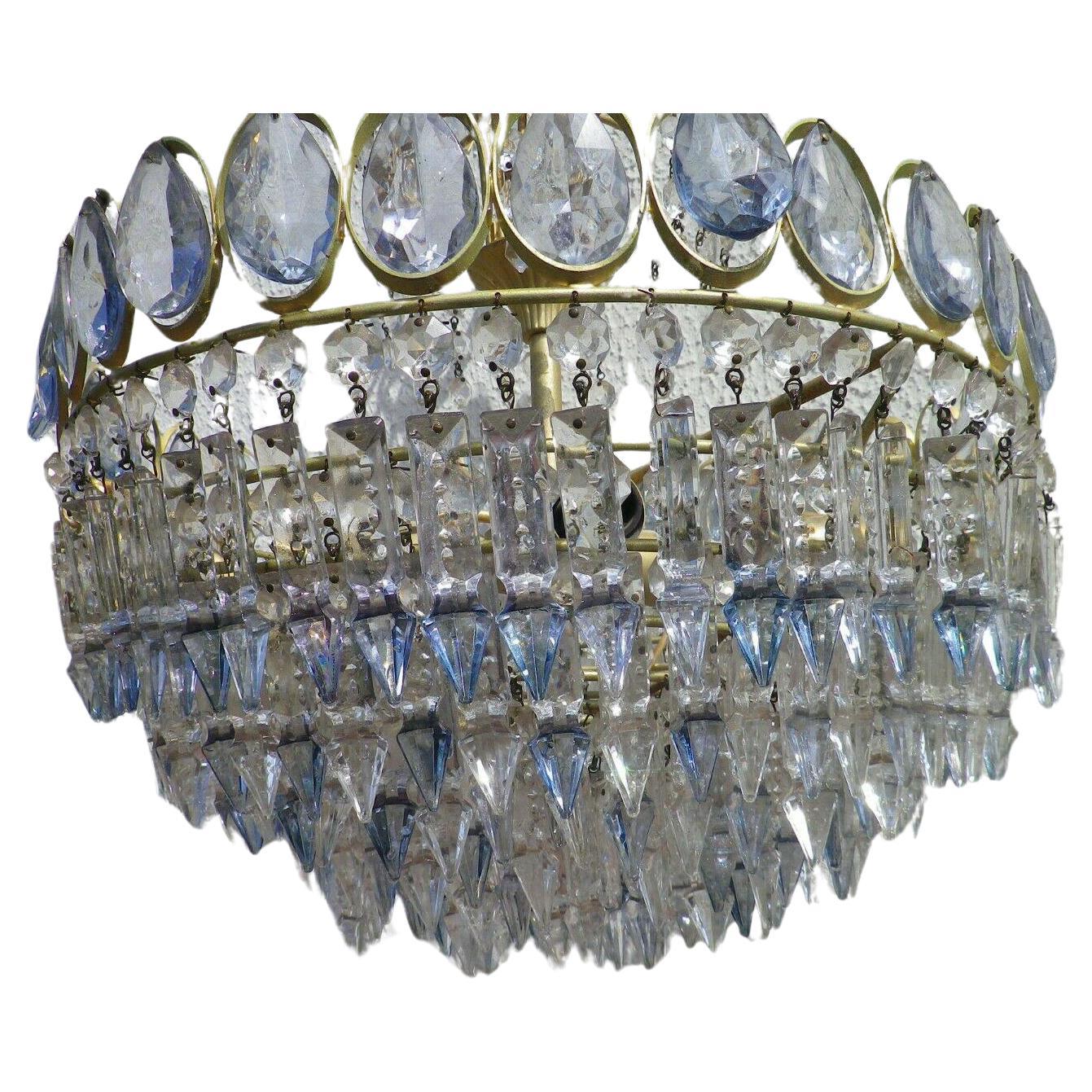 c1960's Austrian Mid Century Modern Cut Crystal Chandelier in Pale Blue Crystal. Full with many tiers of Crystal. 