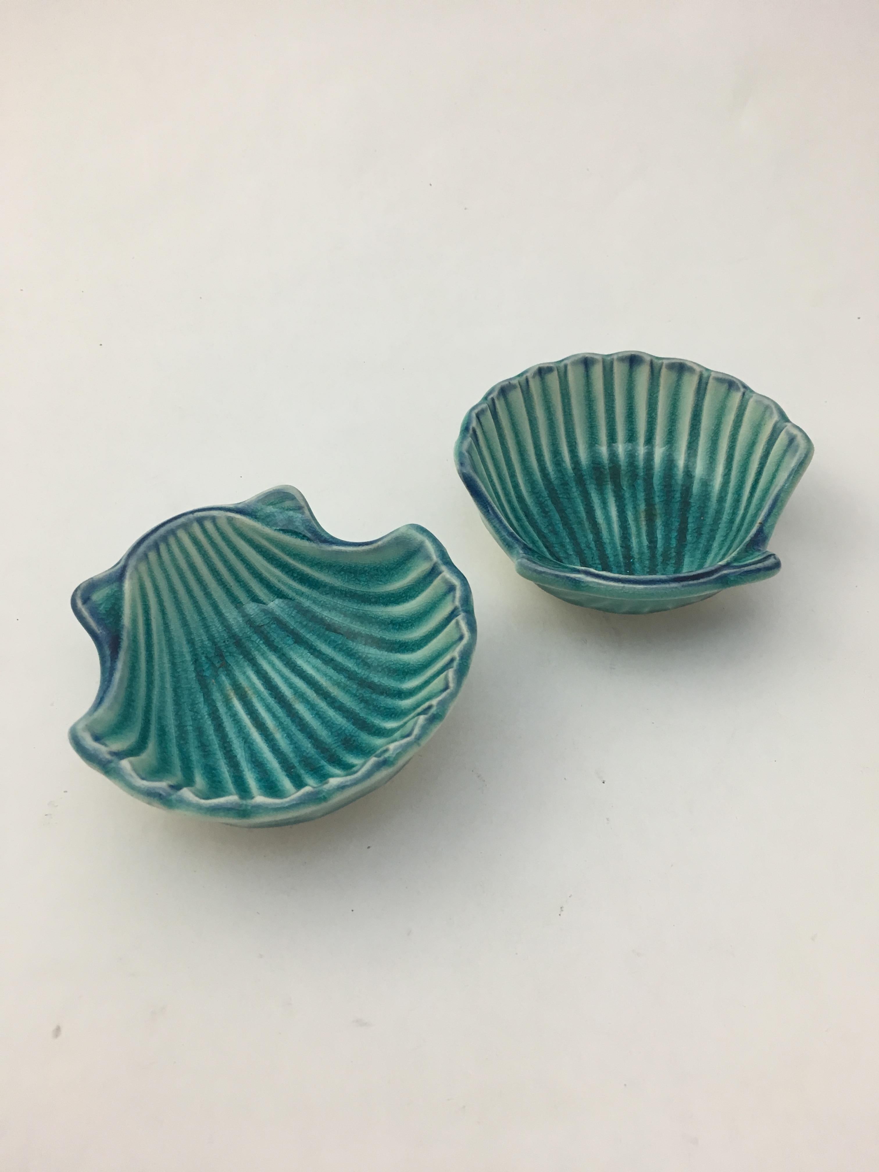 Beautifully glazed azure scallop shell nut bowls or ashtrays. Signed, made in Japan and still retain their paper labels, circa 1960. Very good condition with no chips, cracks or hairlines.