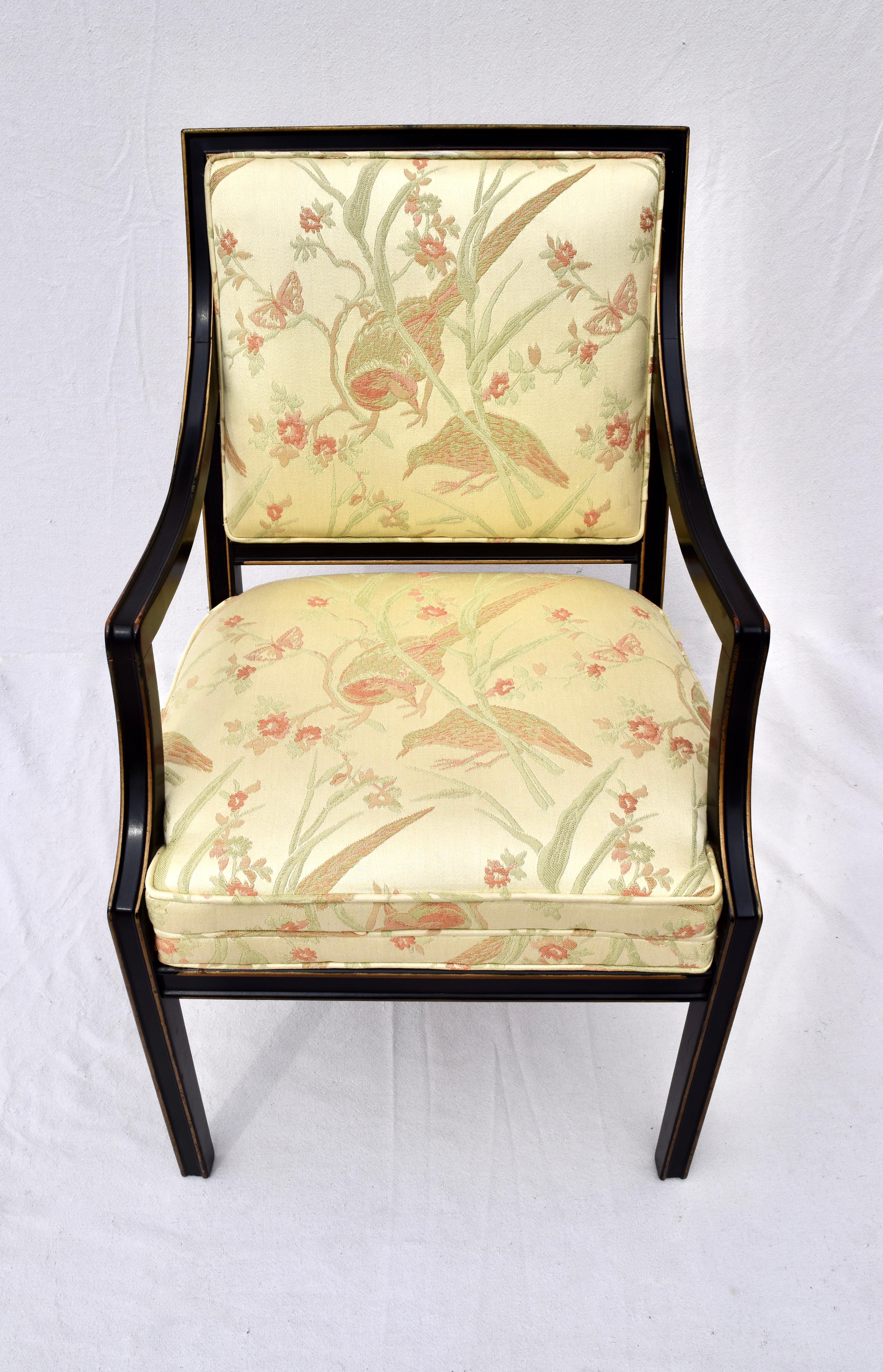 Classic Baker furniture armchair upholstered in designer Canary & Salmon brocade fabric with black lacquer parcel gilt finish. Strong influence to Edward Wormley for Dunbar 