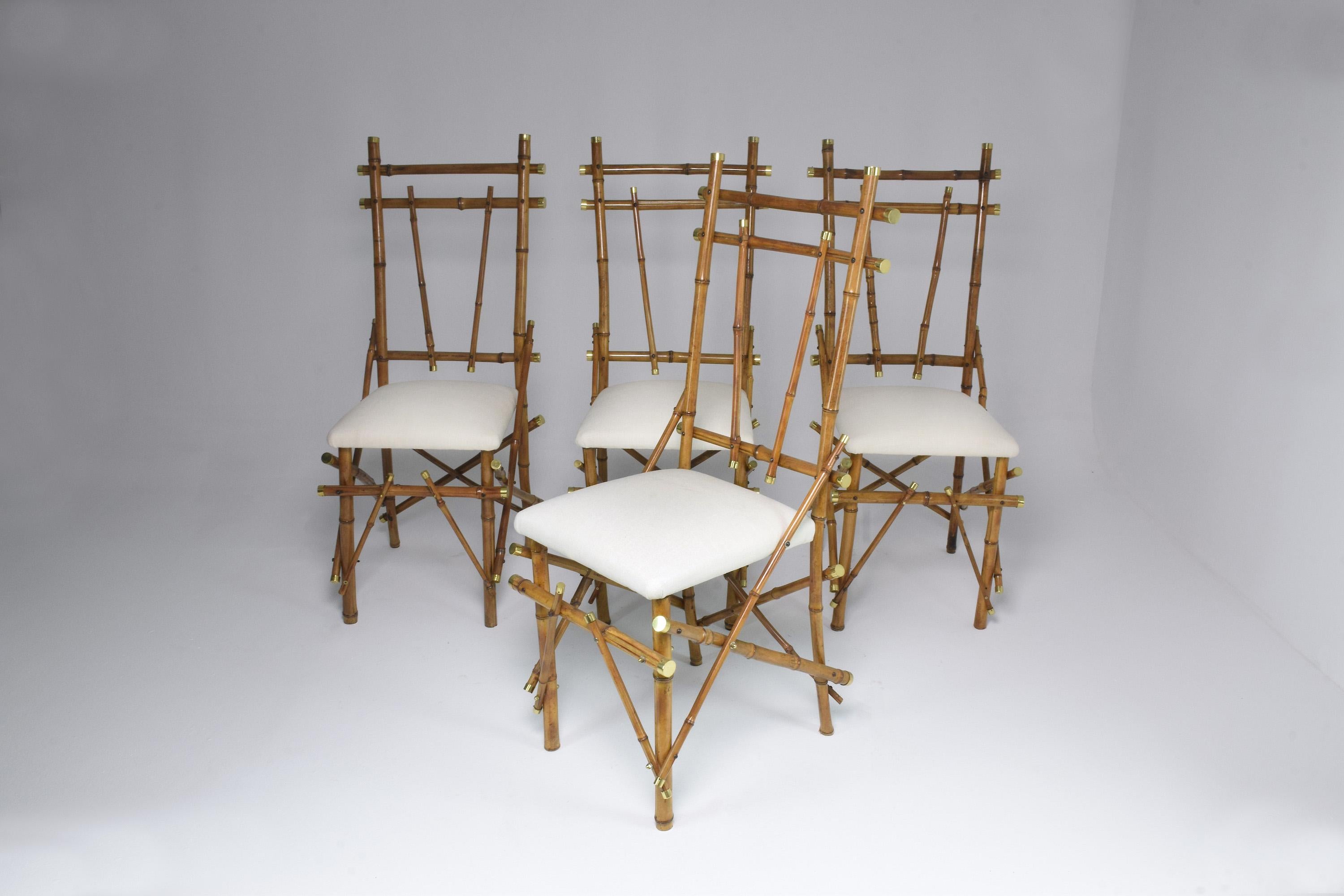 A 20th century set of 4 Italian dining chairs designed with high backrests and bamboo wood structured panels and criss-cross shapes. The polished brass endings give these fantastic collectible chairs a chic touch. In Gabriella Crespi style. 
Italy.