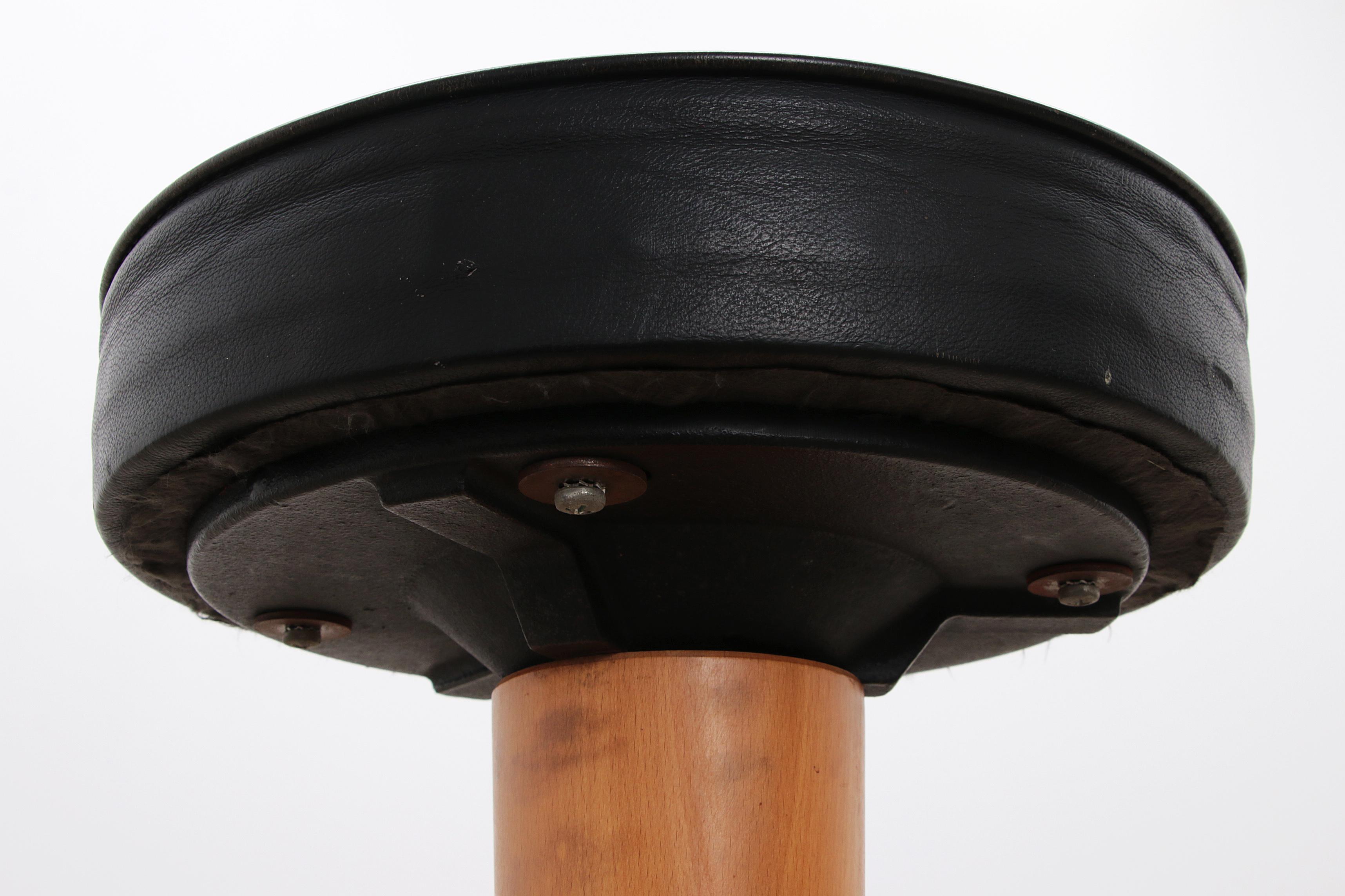 1960s Bar Stool with Cast Iron Base and Leather Seat, set with 7 bar stools. 2