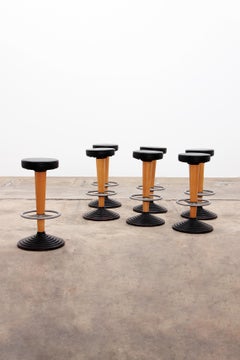 1960s Bar Stool with Cast Iron Base and Leather Seat, set with 7 bar stools.