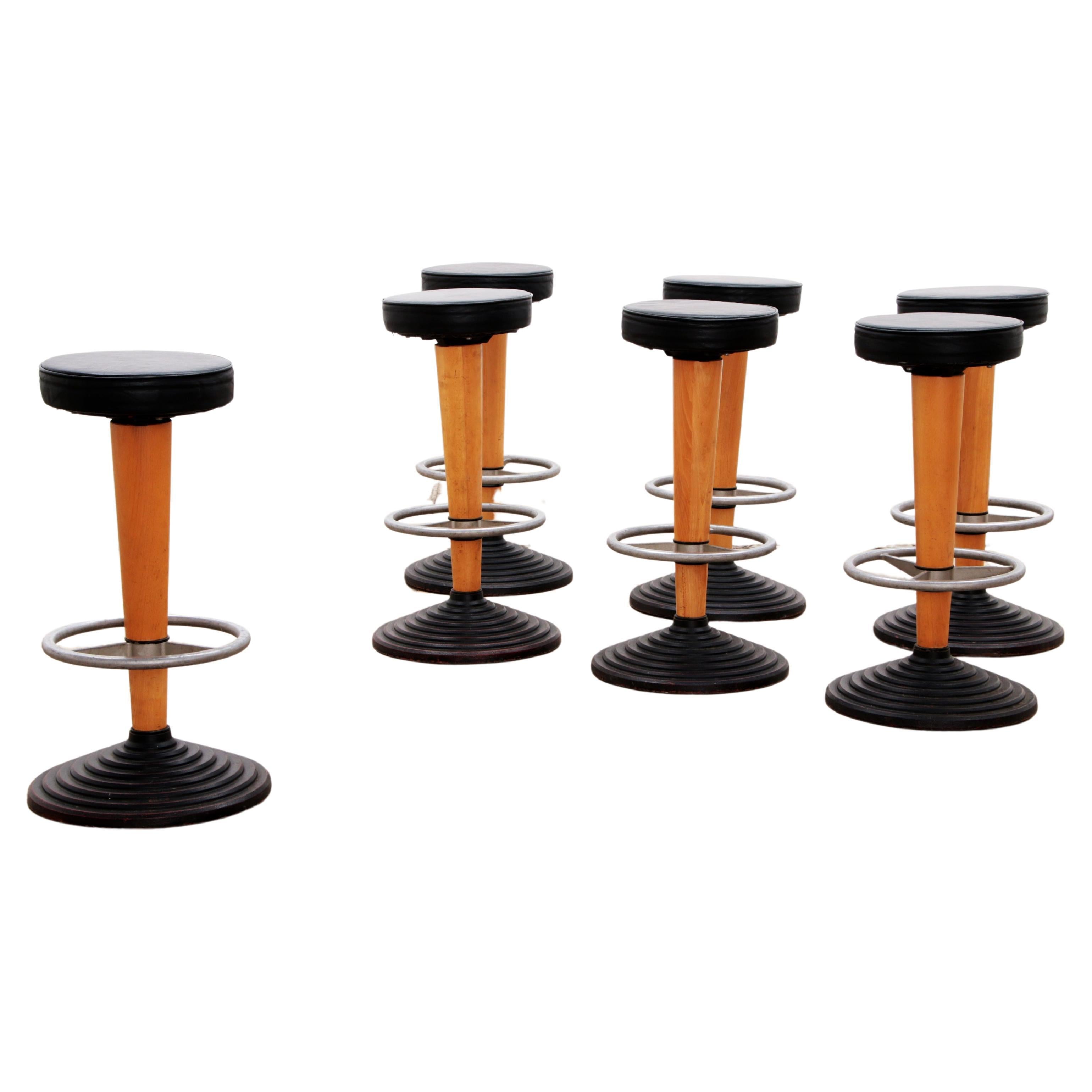 1960s Bar Stool with Cast Iron Base and Leather Seat, set with 7 bar stools. For Sale