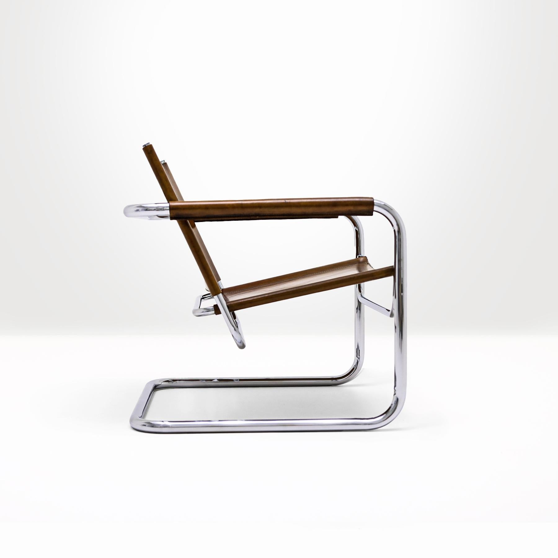 Very rare Bauhaus style chrome and brown saddle leather cantilever chair designed by Heinrich Pfalzberger.

The Rondo cantilever chair by Heinrich Pfalzberger, and manufactured by Pfalzberger Design in Basel, is an excellent example of 1960s Swiss