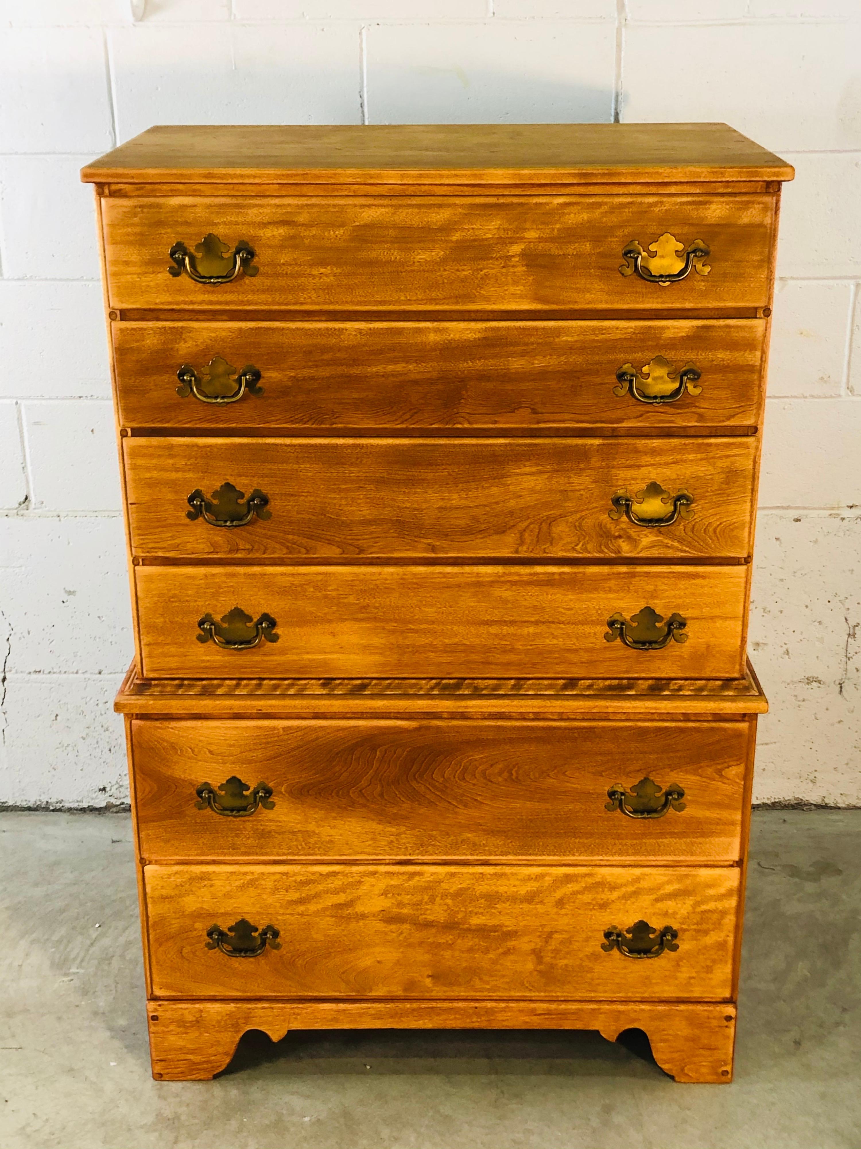 Vintage 1960s tall maple wood dresser by Baumritter - Ethan Allen. The dresser is from the Colonial series and has six drawers for storage. Drawers range from 4” to 7” in height. The drawers are brass and the dresser is marked in the drawer.