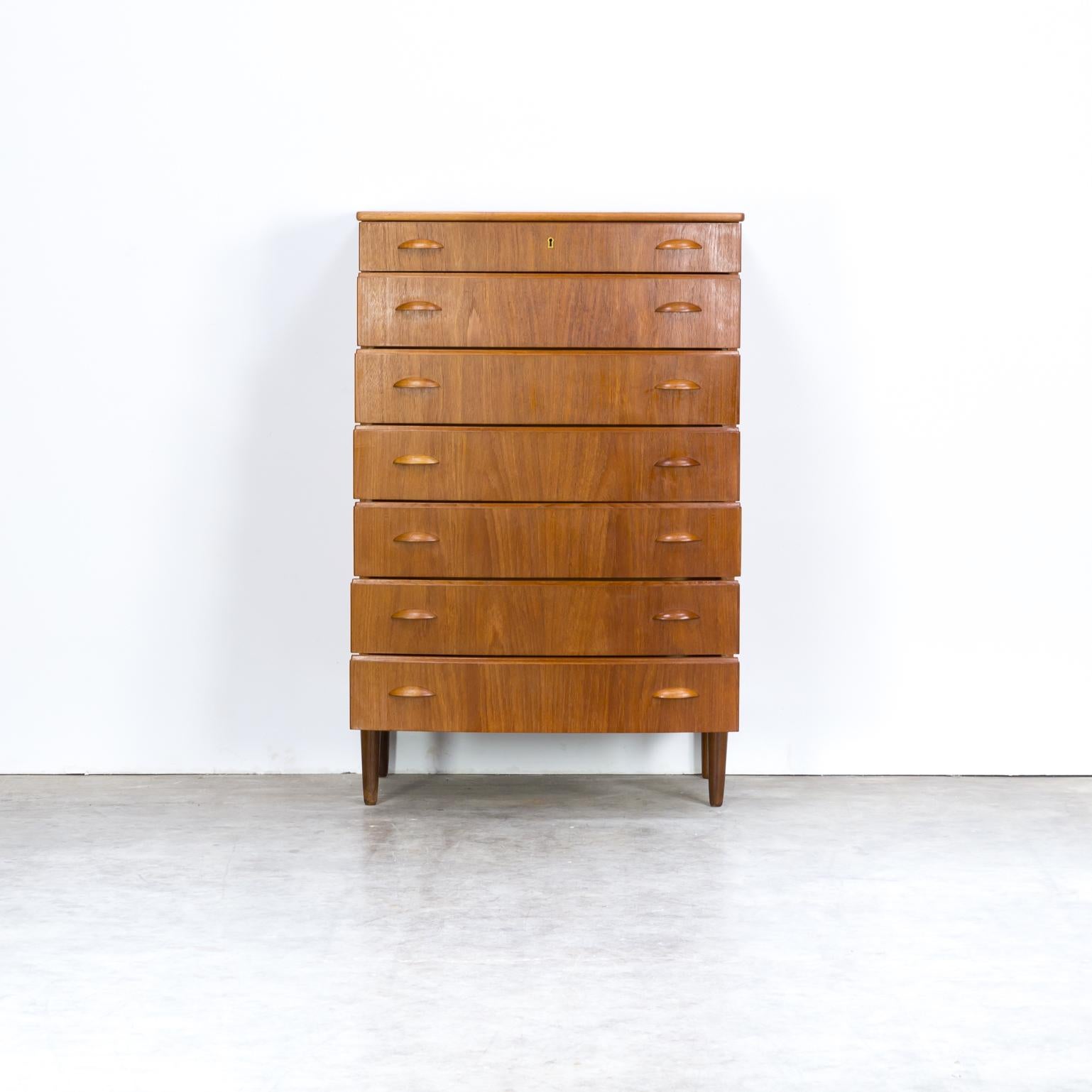 60s Beautiful teak veneer seven drawer cabinet. Good condition, consistent with age and use.