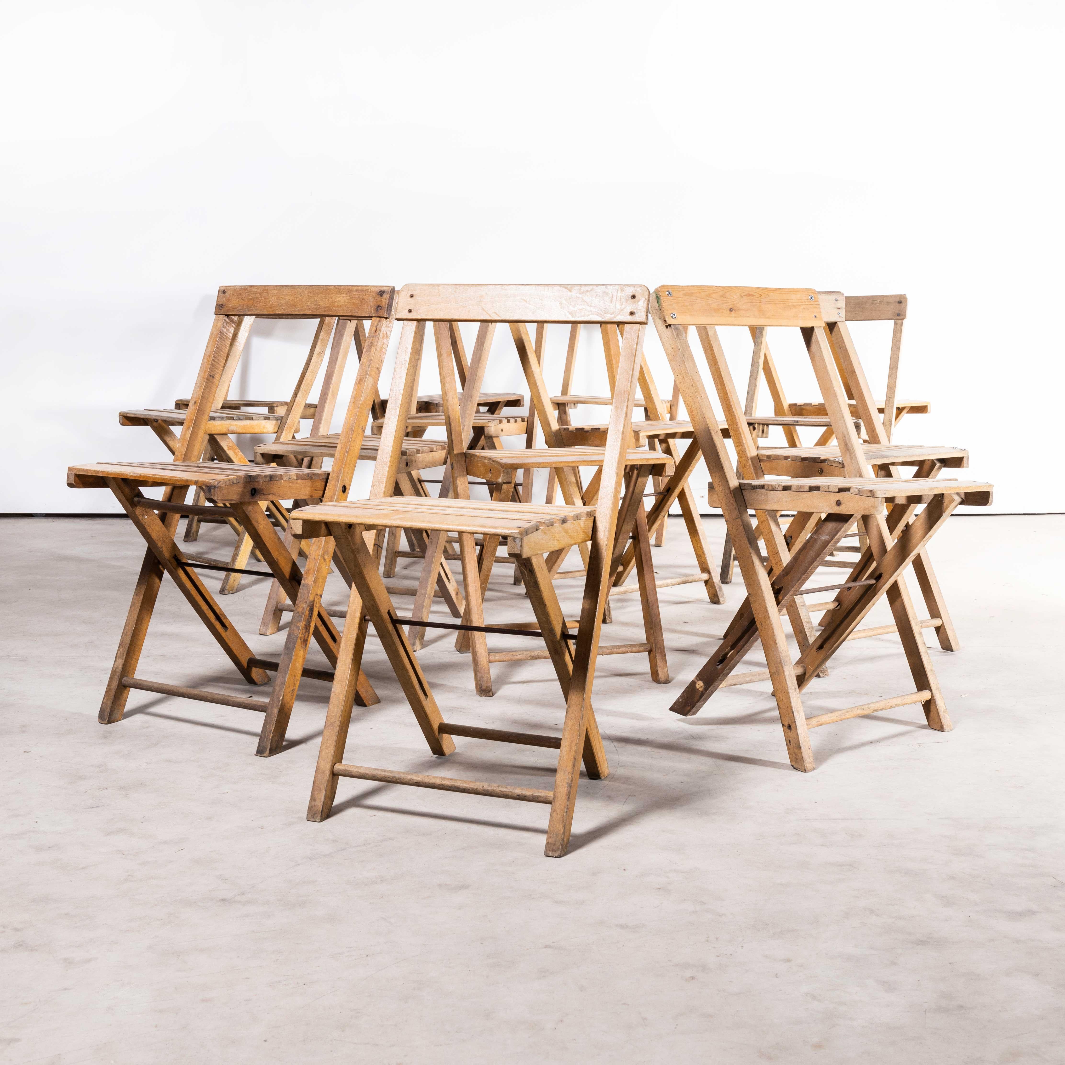 1960s beech folding chairs – set of fourteen
1960s beech folding chairs – set of fourteen. Good practical Classic folding chairs originally made in Germany of solid beech. Every chair passes through our workshops where they are cleaned and