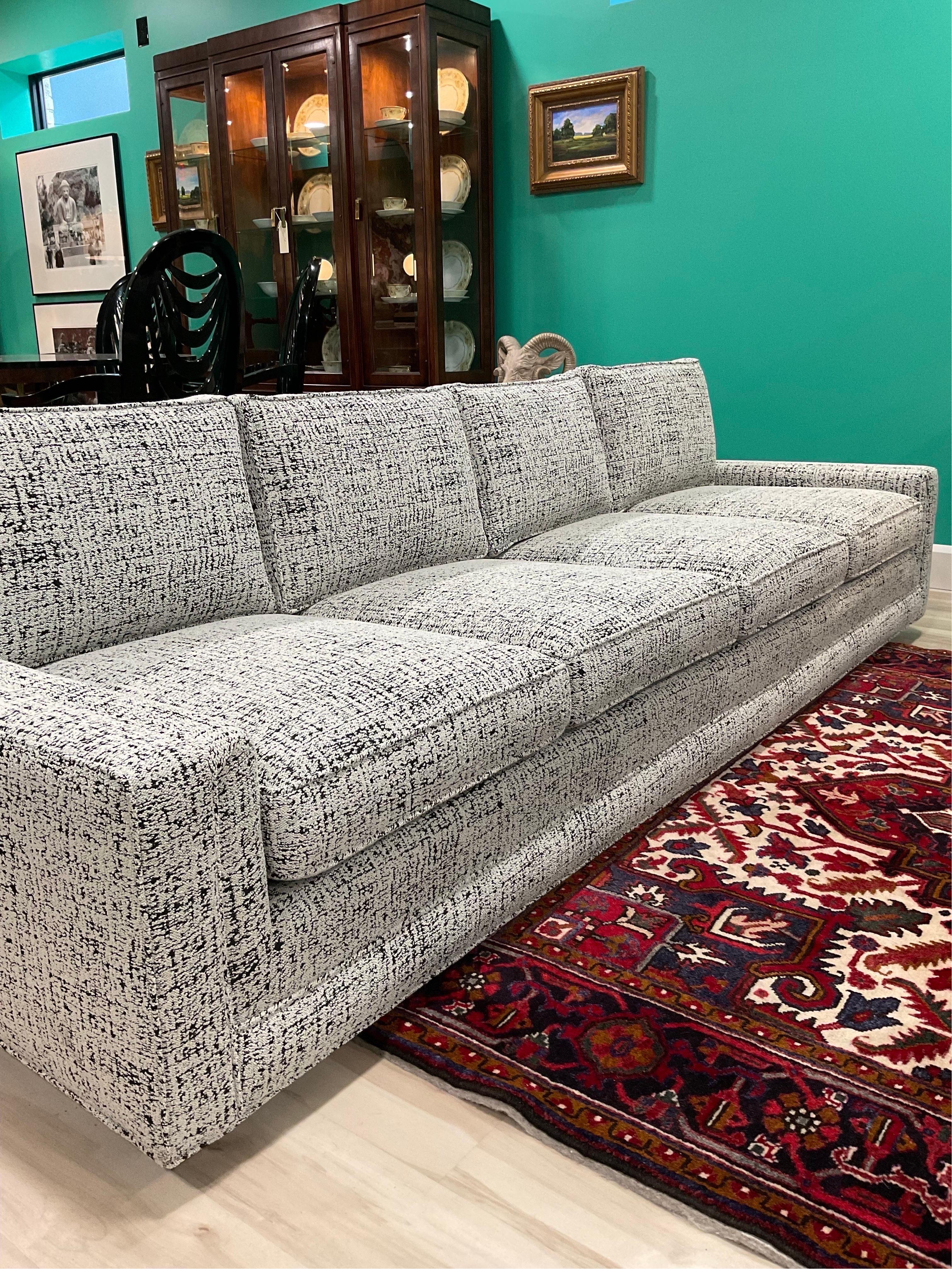 This is one very cool cat. Epic renovation just back from the Upholstery Masters and wrapped in the most sophisticated Boucle you’ve ever seen, from Kravet. White and dark charcoal. It’s brilliant. Spectacular lines. Just a wonderful piece. Very