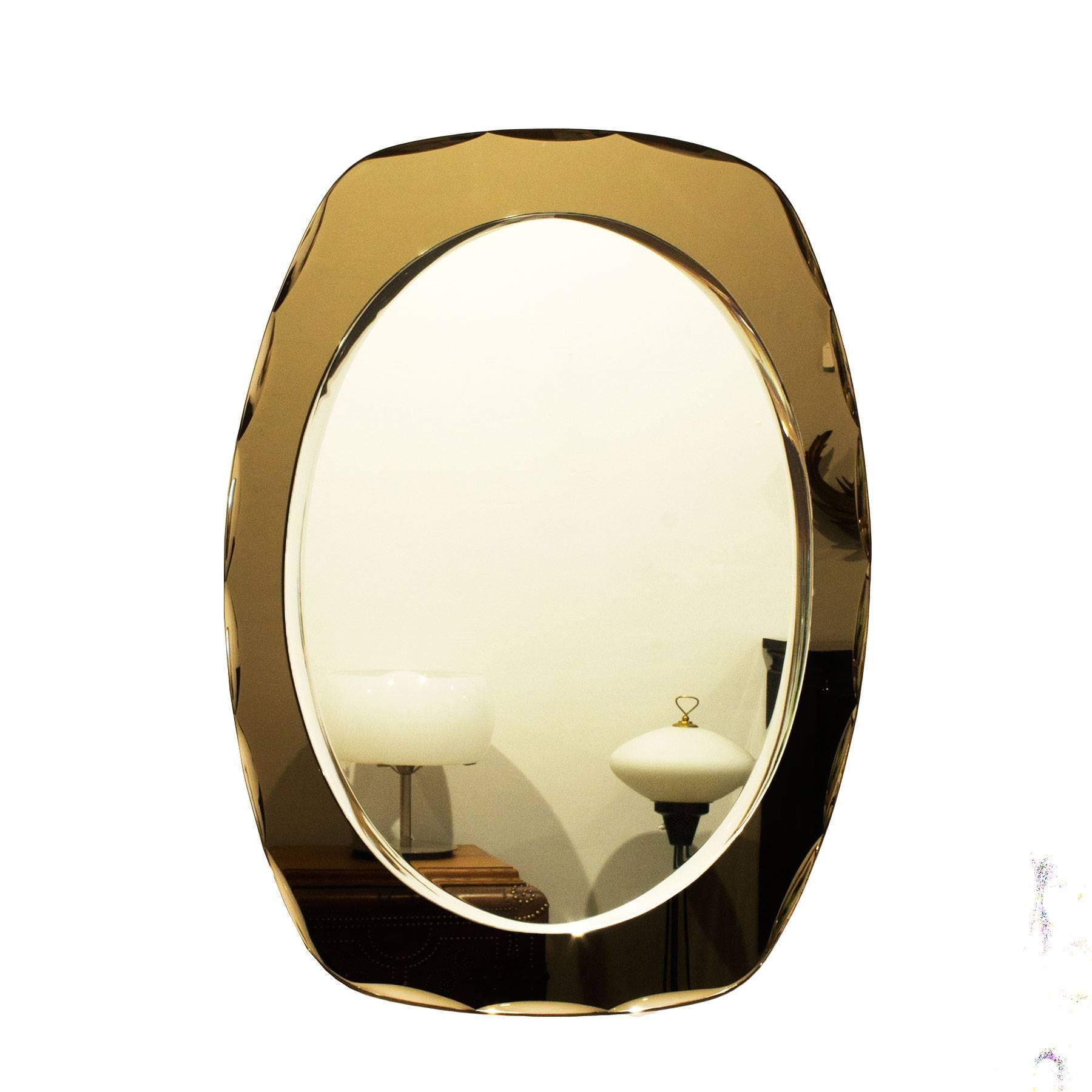Bevelled mirror with smoked bronze decorative bevelled mirror frame.

Italy, circa 1960.