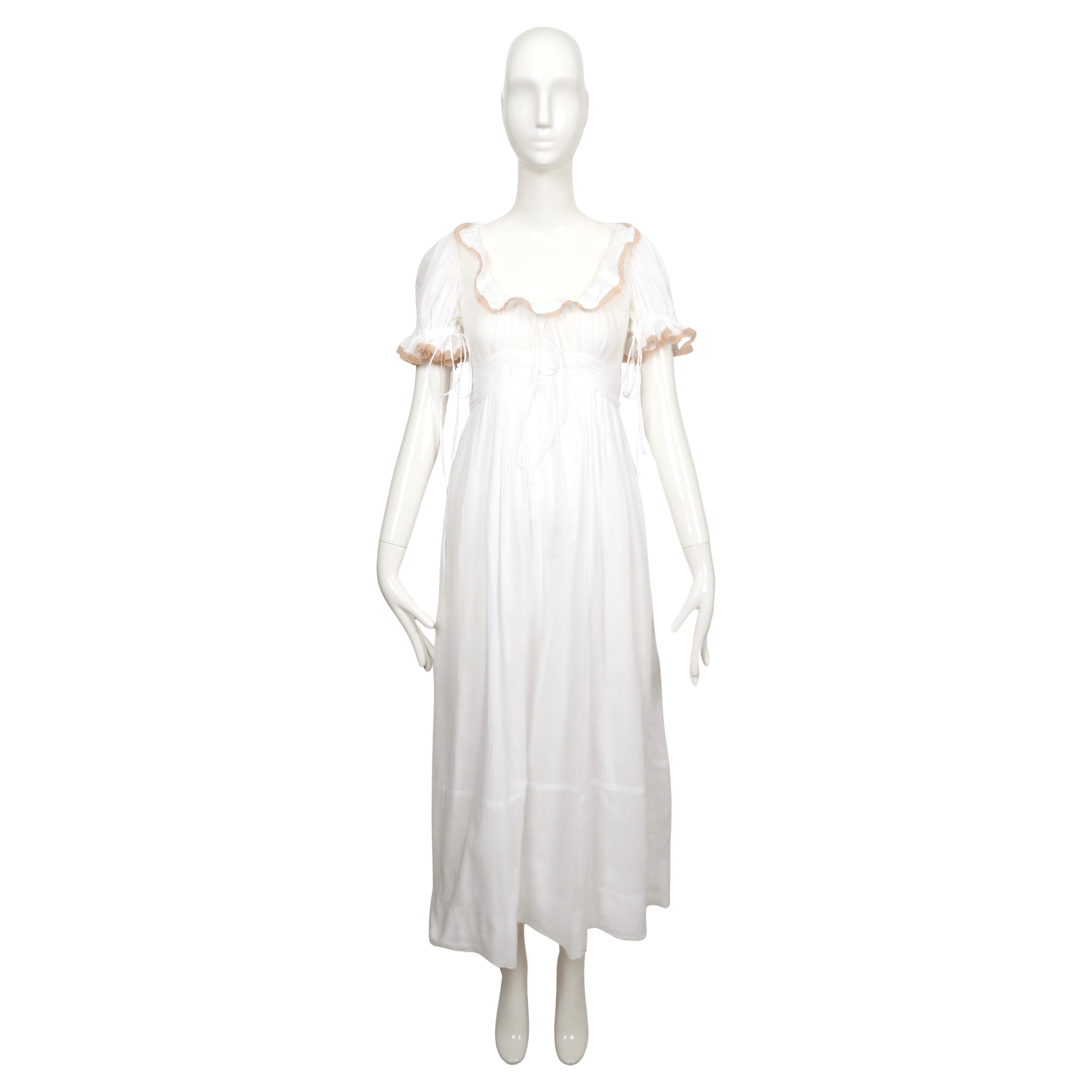 Very rare, long white cotton gauze dress with tan lace dress designed by  Barbara Hulanicki for Biba dating to the 1960's. Best fits a size 2. Approximate measurements: shoulder 14