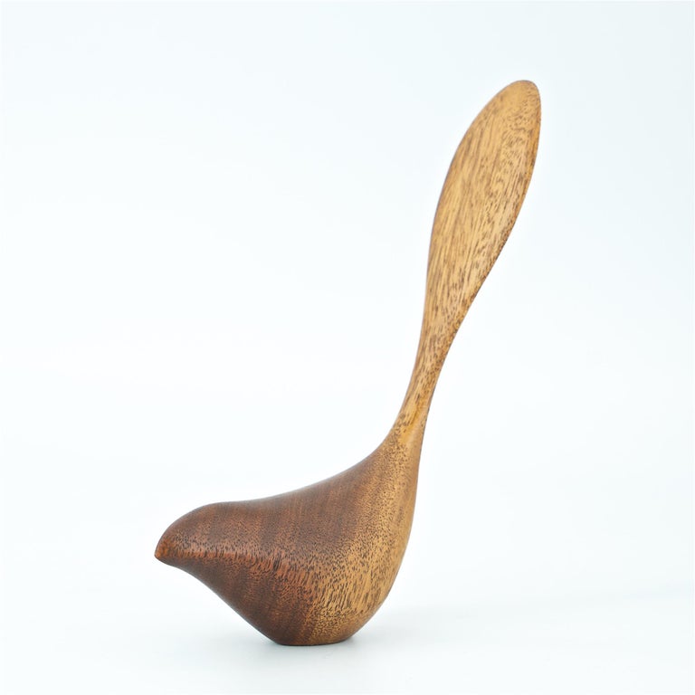 Wonderful small self-standing table sculpture of a bird-form in Bissilon wood.

Emil Milan (American, 1922–1985). Milan was a major contributor to the studio Craft movement in the United States. His anamorphic sculptures and organic functional