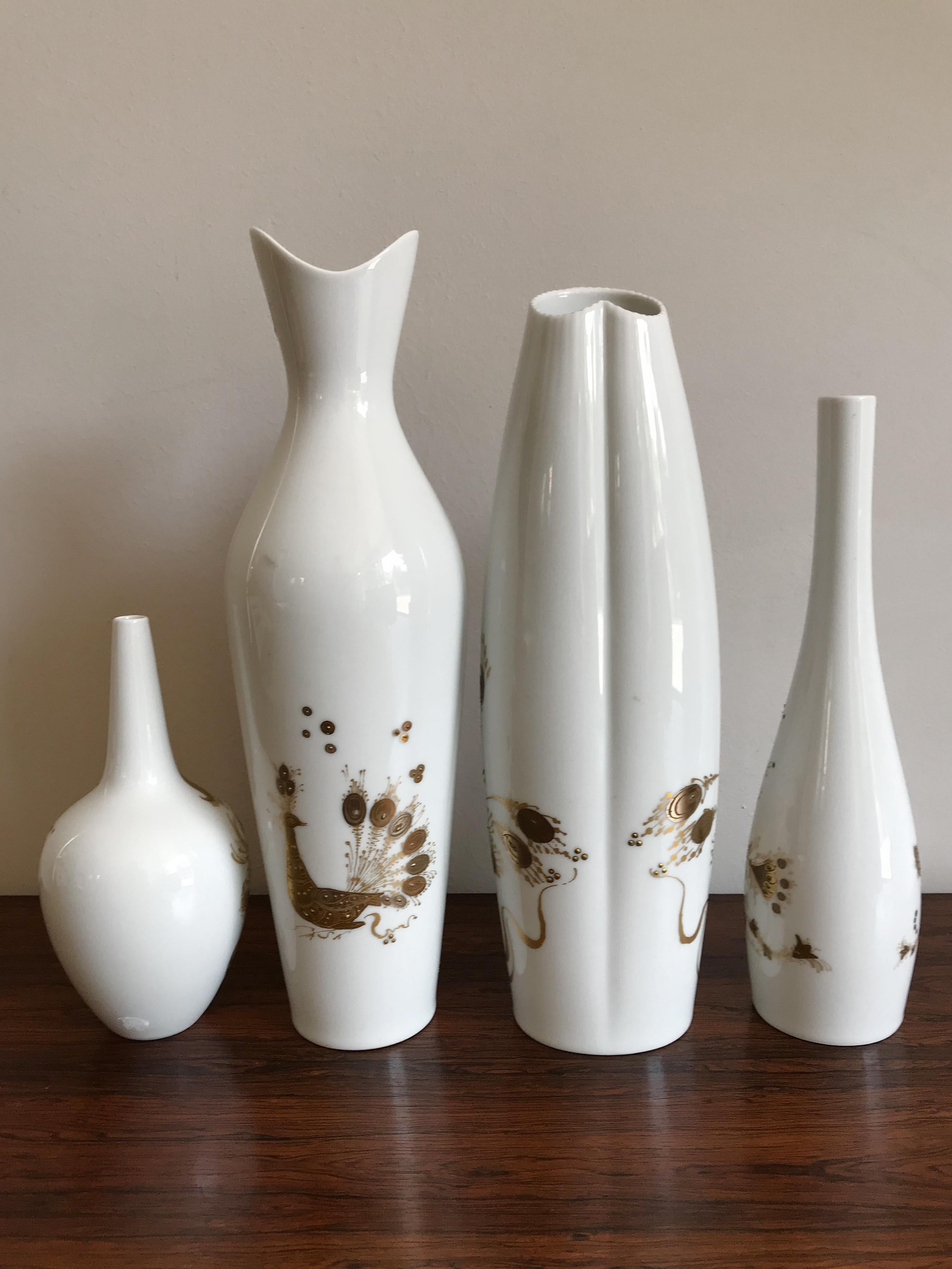 1960s porcelain vases set designed by Danish artist Bjorn Wiinblad for Rosenthal Studio Linie Quatre Couleurs with gold decoration and with mark printed on the bottom, midcentury modern design.
dimensions from the left:
height cm 19 - diameter cm