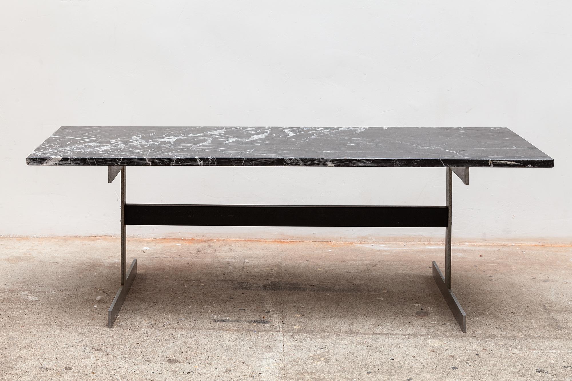 Vintage 1970s coffee table. Silver and black metal base with attractive black and white veined marble top. Dimensions: 46 W x 40 H x 120 D cm.