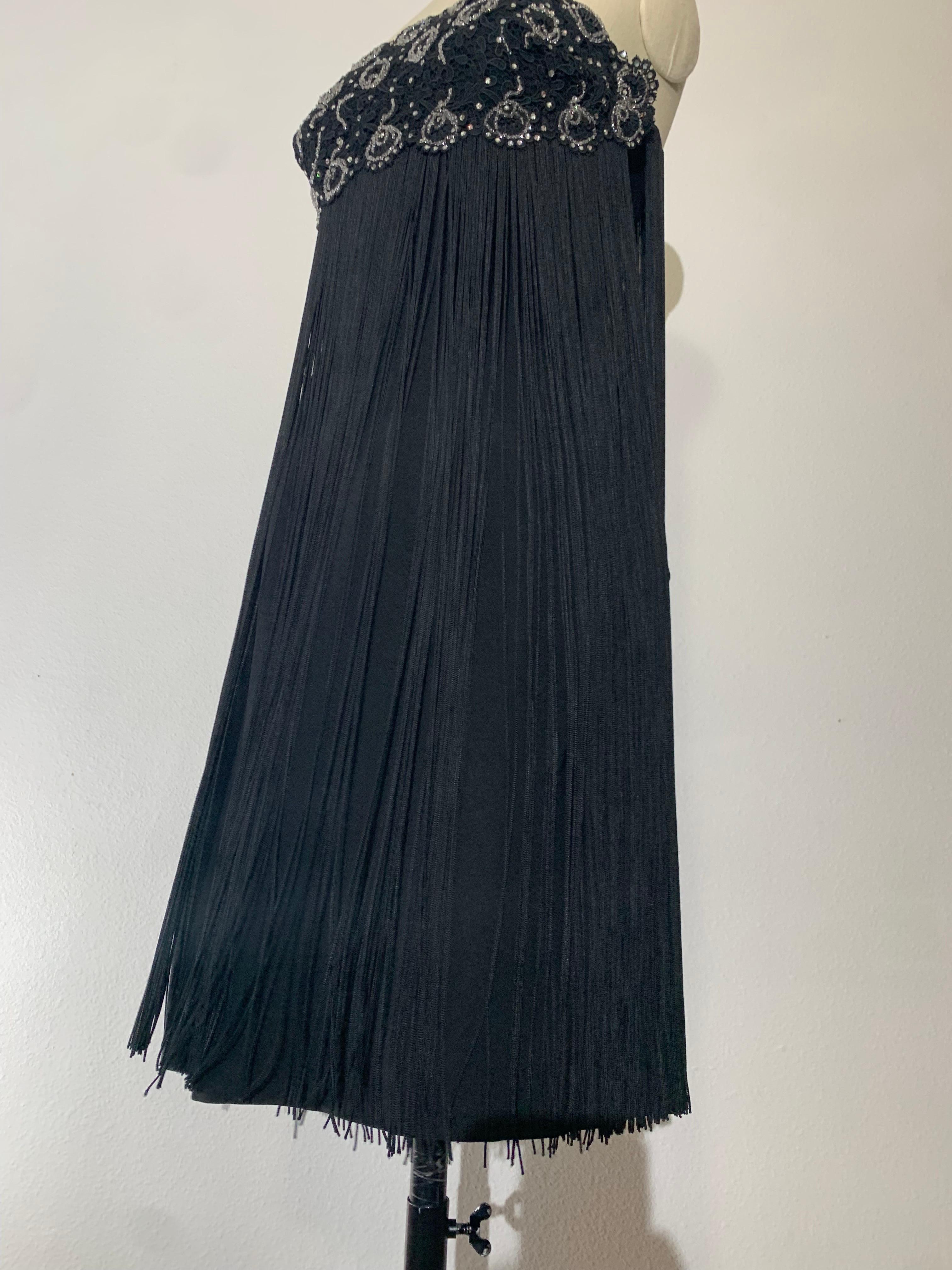 1960s Black Beaded Lace Bodice Cocktail Sheath Dress w Outrageous Fringe:  This is a spectacular, unlabeled extremely well-made dress with a heavily boned bodice to support the extravagant lace and beadwork bodice as well as the curtain of fringe