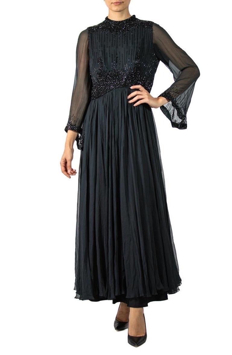 1960S Black Beaded Silk Chiffon Demi-Empire Waist Gown With Bell Sleeves For Sale 1