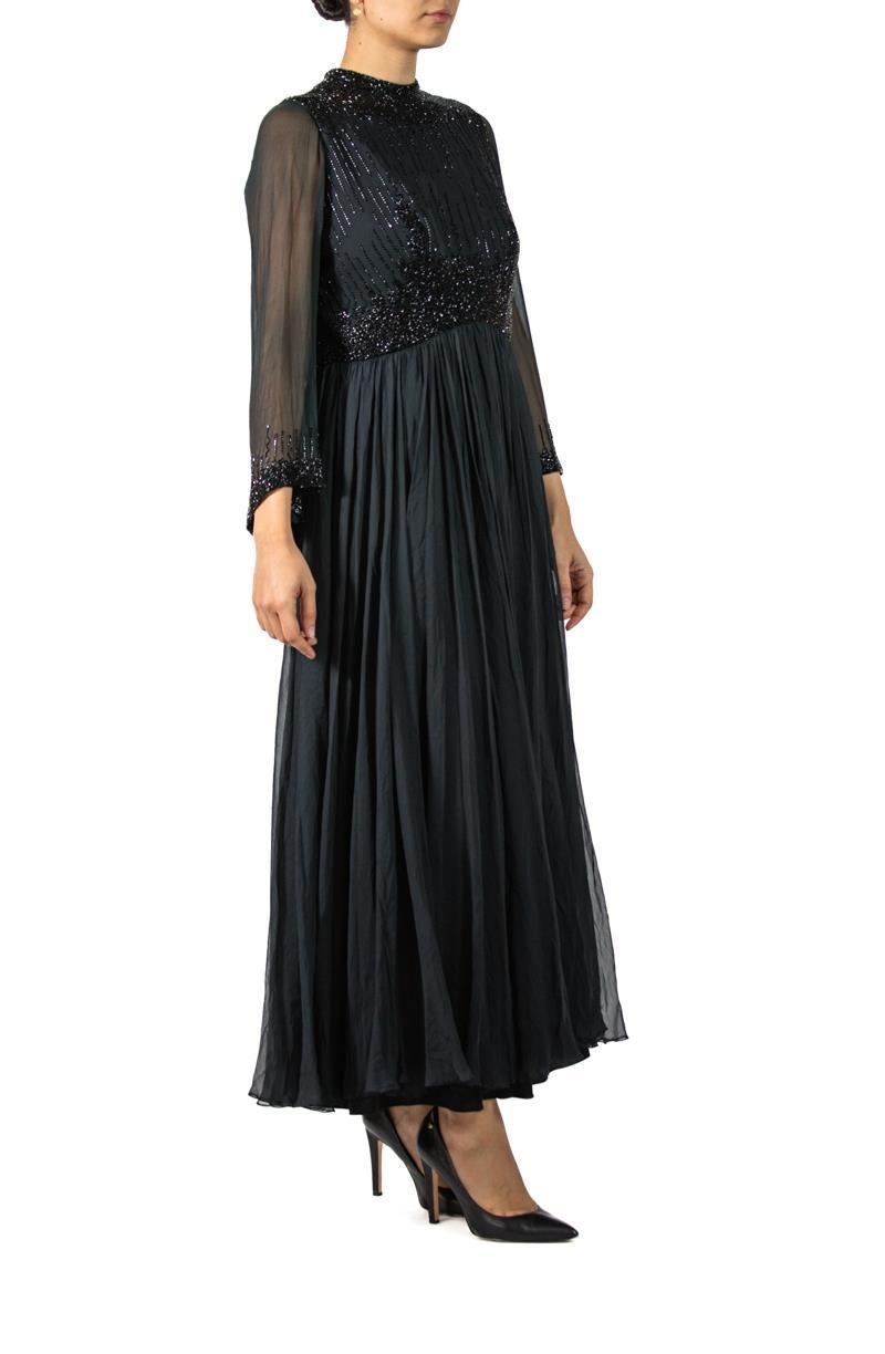 1960S Black Beaded Silk Chiffon Demi-Empire Waist Gown With Bell Sleeves For Sale 2