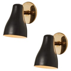 Pair of 1960s Black & Brass Wall Lamps Attributed to Jacques Biny