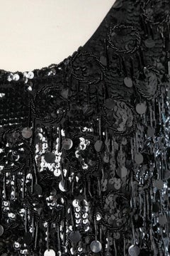 1960's black fully embroidered with fringes of  beads and sequins dress