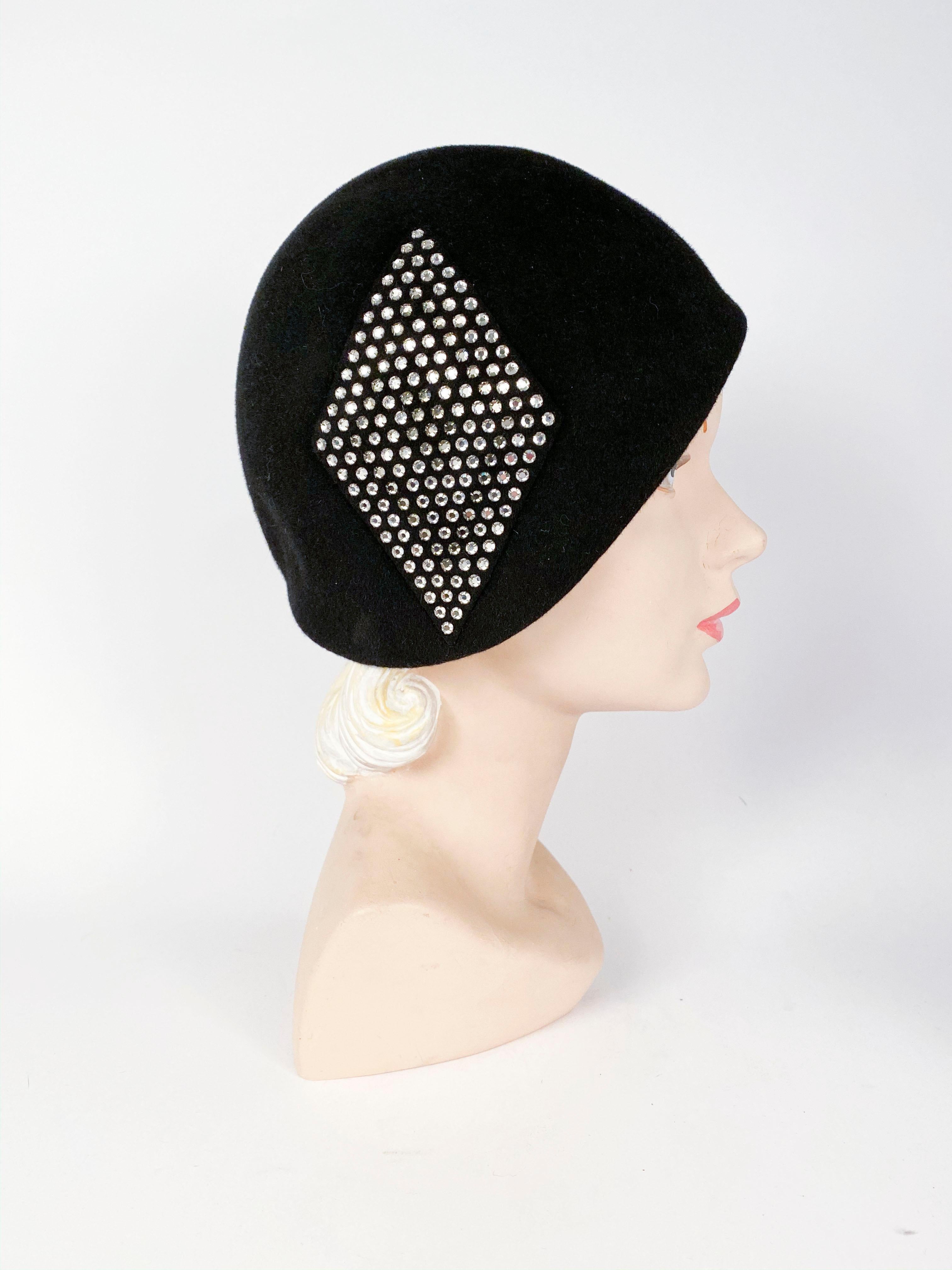 1960s black fur felt bucket hat with diamond-shaped two-tone crystal rhinestone applique.