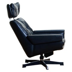 années 1960:: cuir noir:: Rosario:: fauteuil à bascule pivotant par Kurt Hvitsjö pour Isku