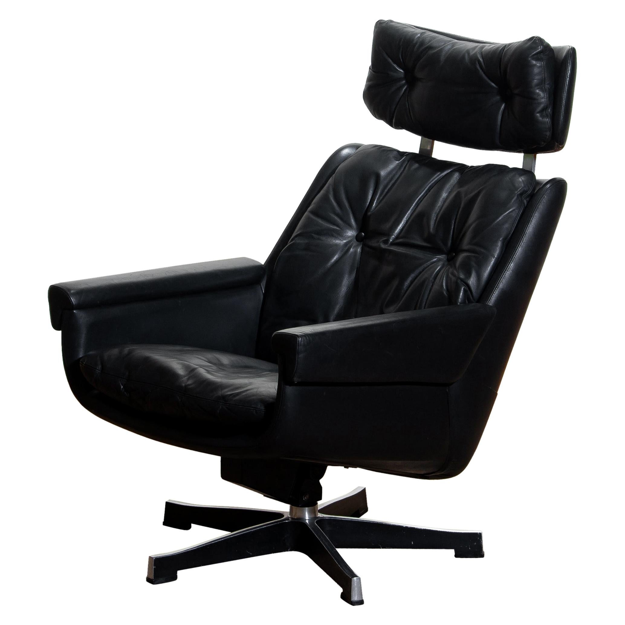 Mid-Century Modern 1960s, Black Leather, Rosario, Swivel Rocking Chair by Kurt Hvitsjö for Isku