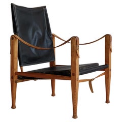 Retro 1960s Black leather Safari chair by Kaare Klint