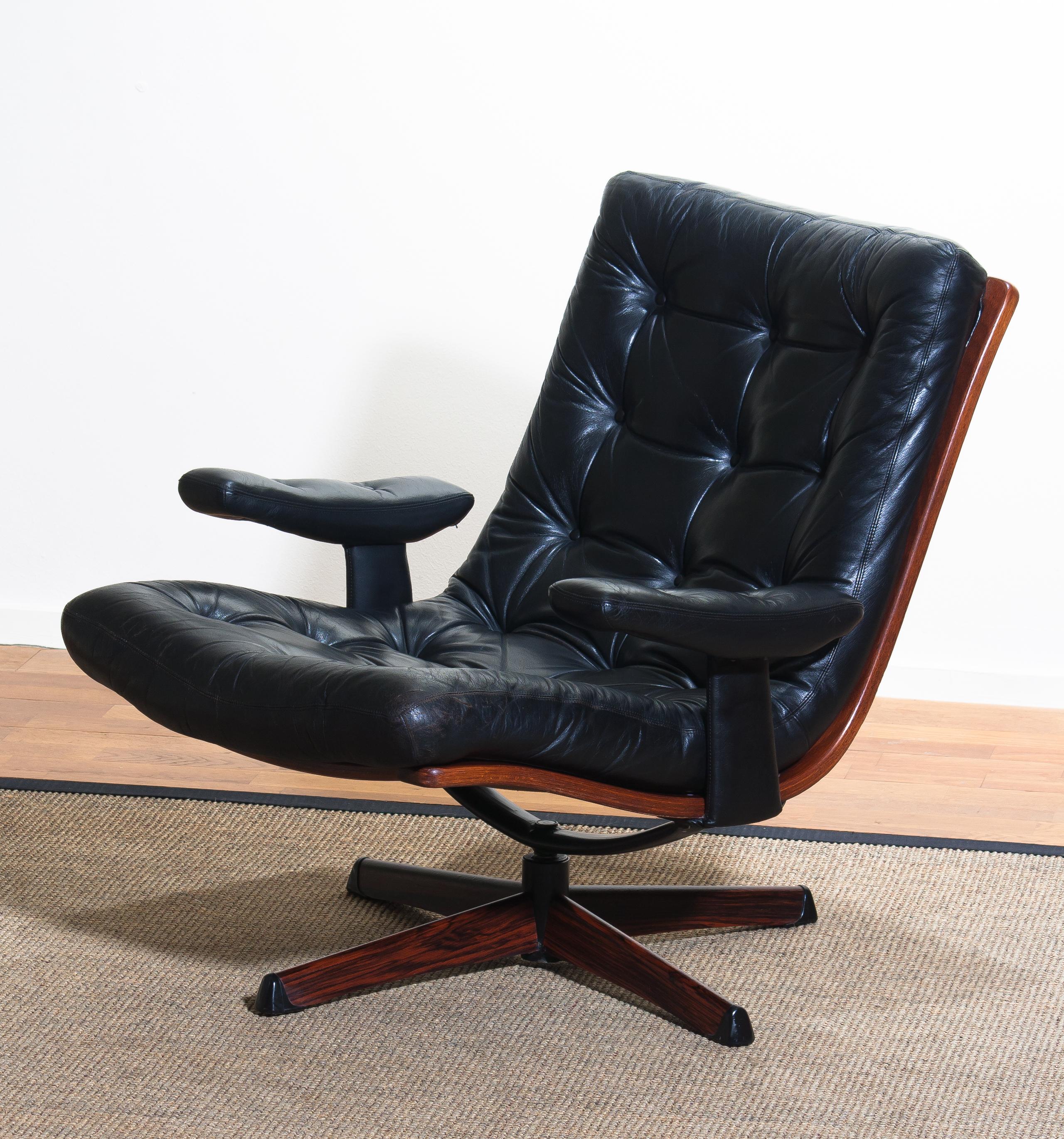 Mid-20th Century 1960s, Black Leather Swivel Chair with Jakaranda Stand by Göte Design Nässjö
