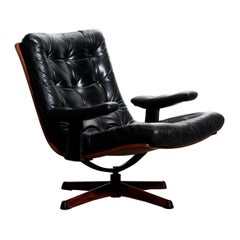 1960s, Black Leather Swivel Chair with Jakaranda Stand by Göte Design Nässjö