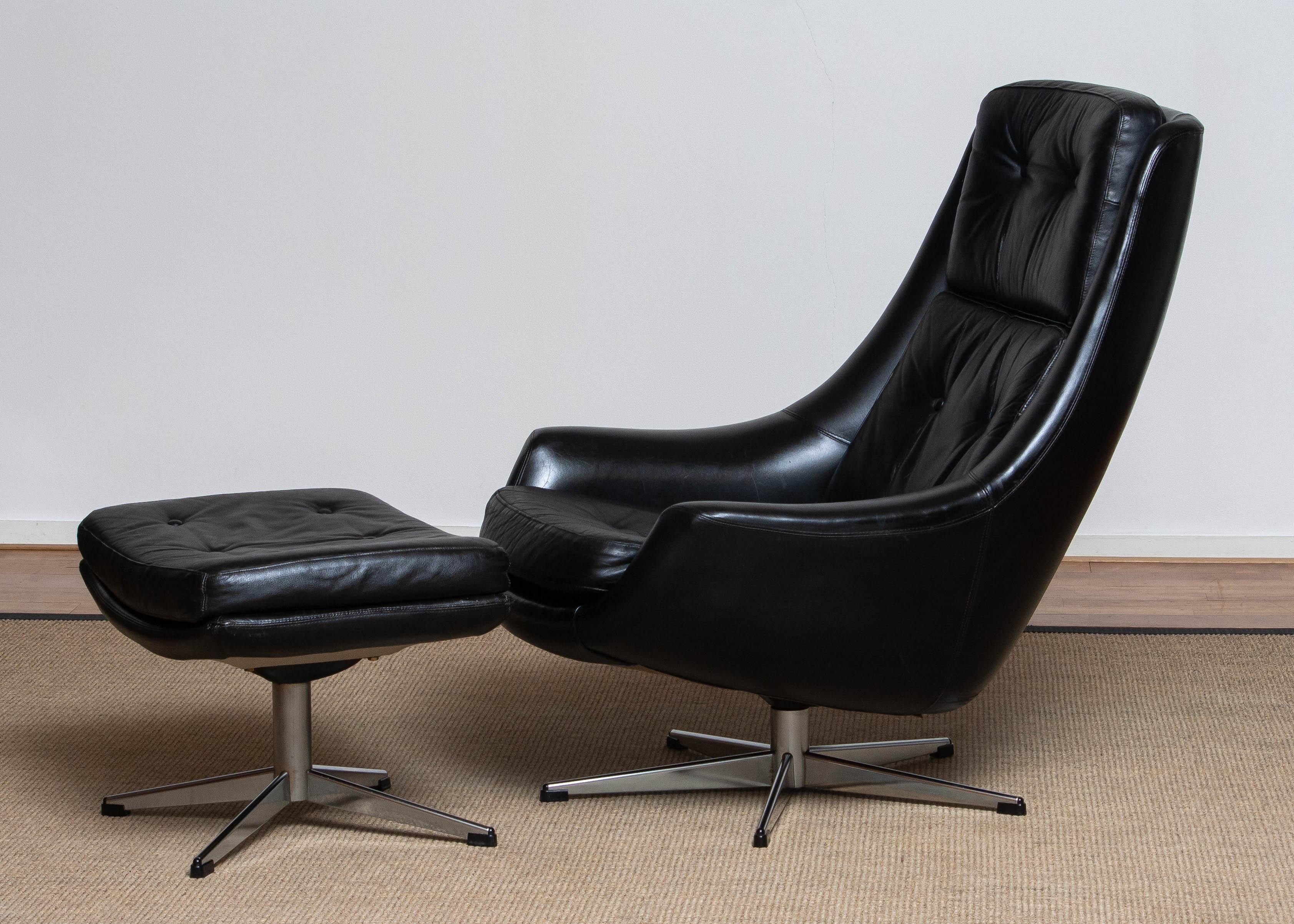 black leather swivel chair with ottoman