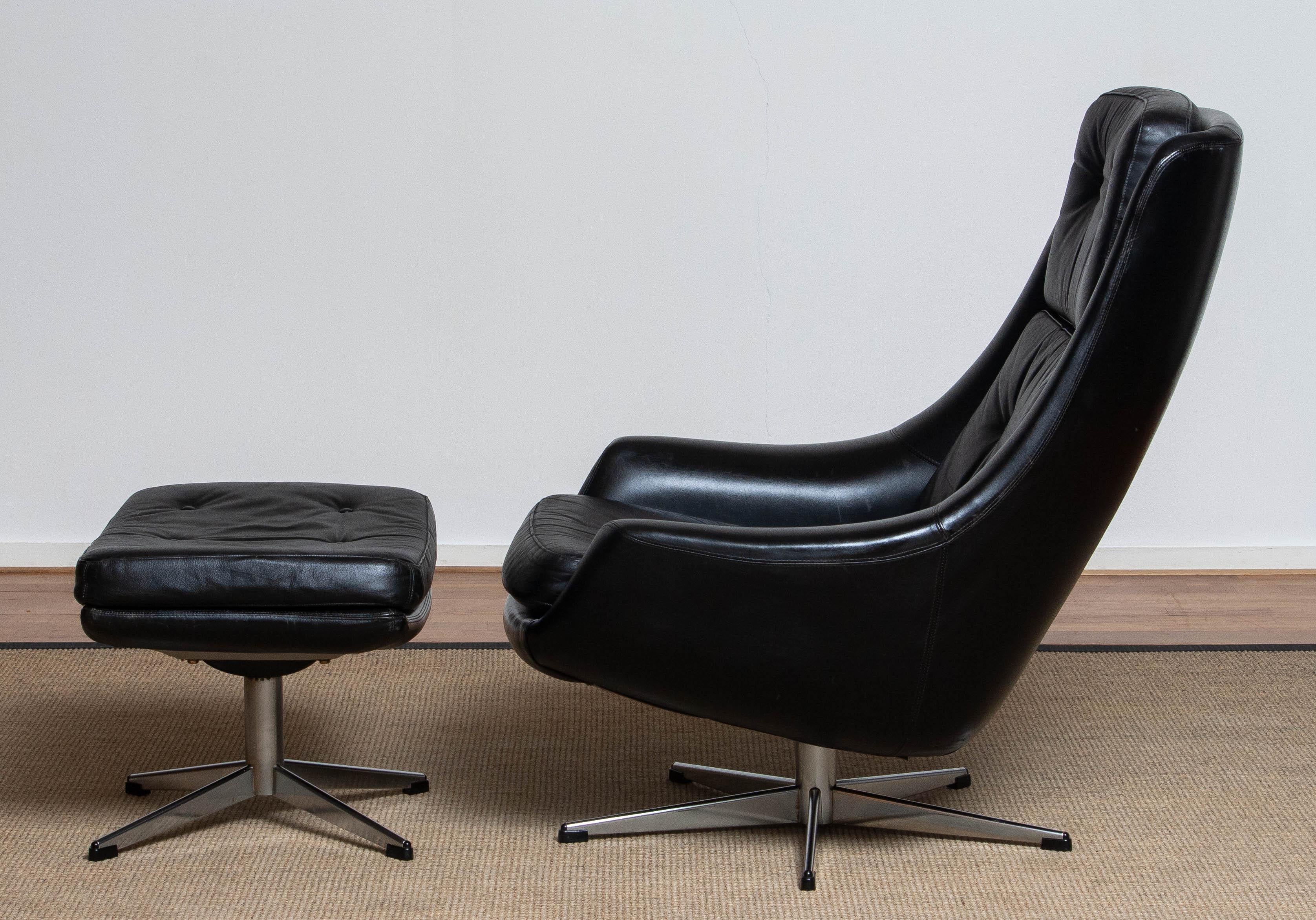 Modern 1960s Black Leather Swivel Chair with Matching Ottoman by H.W. Klein for Bramin