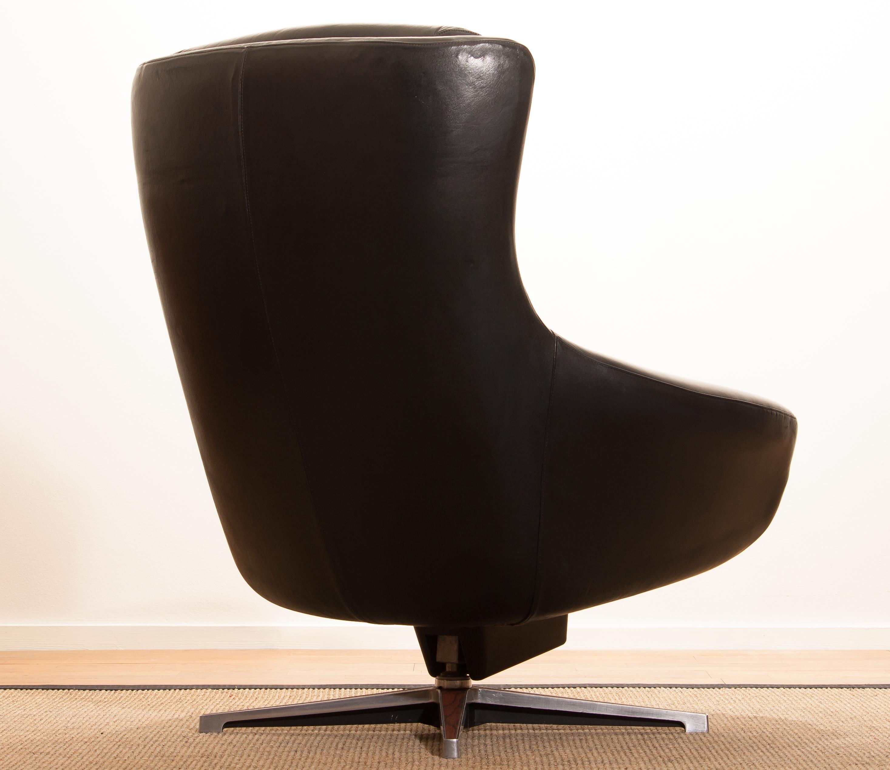 Swedish 1960s, Black Leather Swivel Rocking Lounge Chair by Lennart Bender