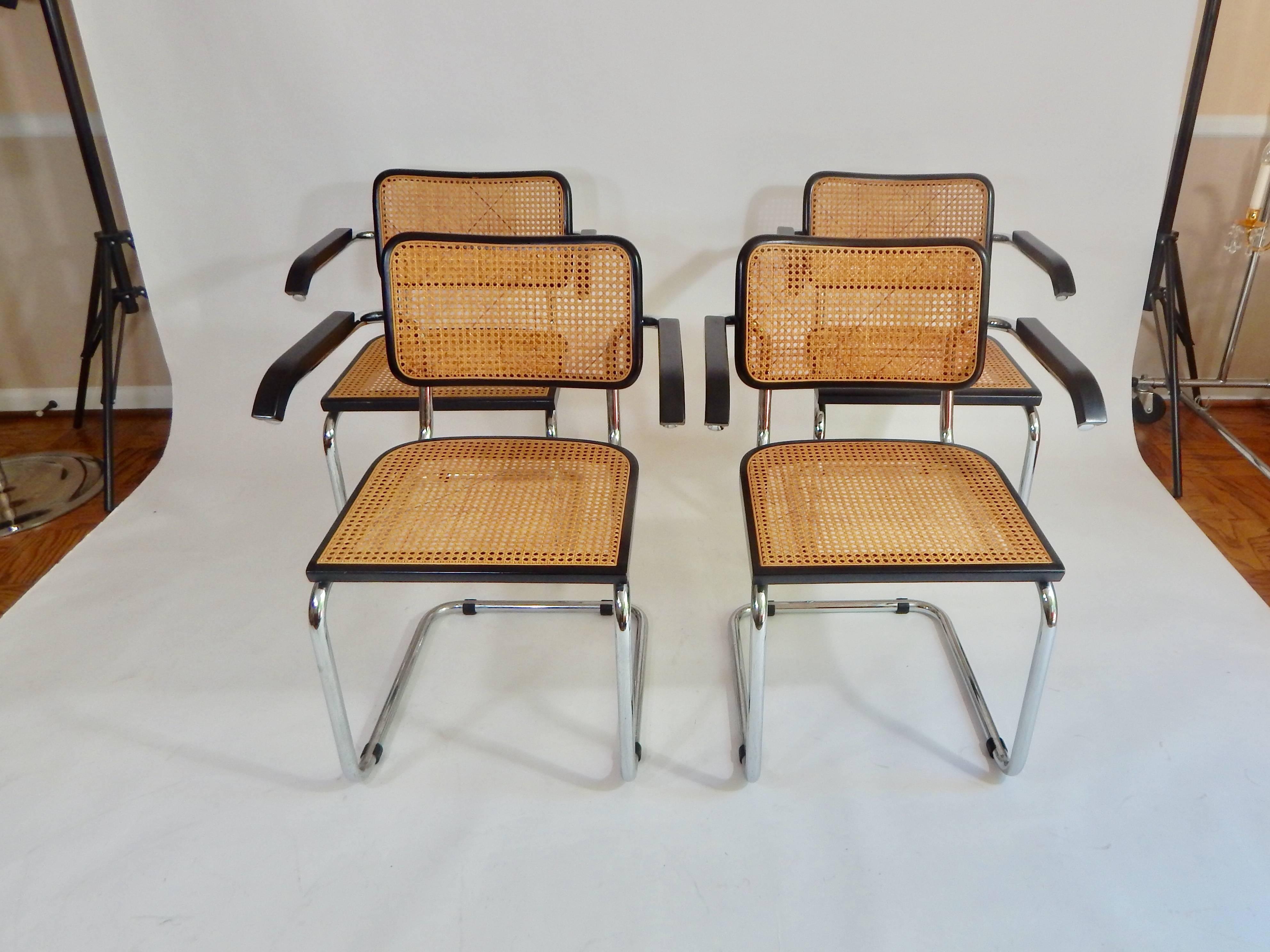 1960s Marcel Breuer Cesca chairs. Made in Italy. Wood has black finish with cane seats and backrests and chrome frames, midcentury 1960s production. Rare to find a complete matching set where all chairs are in this level of condition with caning