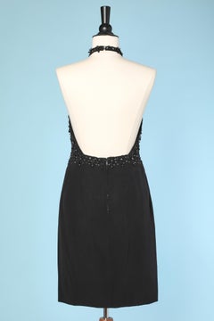 1960's black rayon cocktail dress with beaded work on the bust