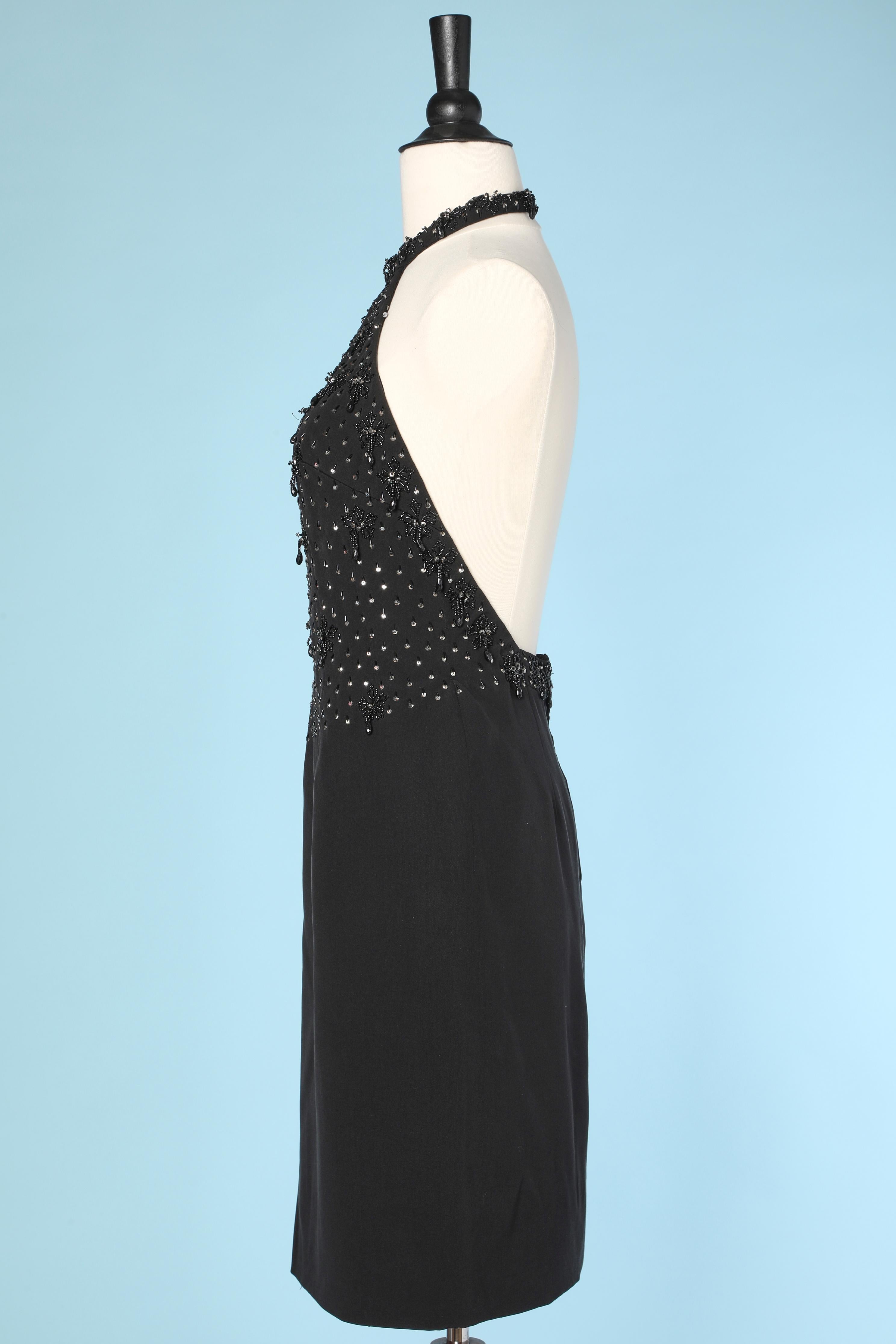 Black 1960's black rayon cocktail dress with beaded work on the bust For Sale