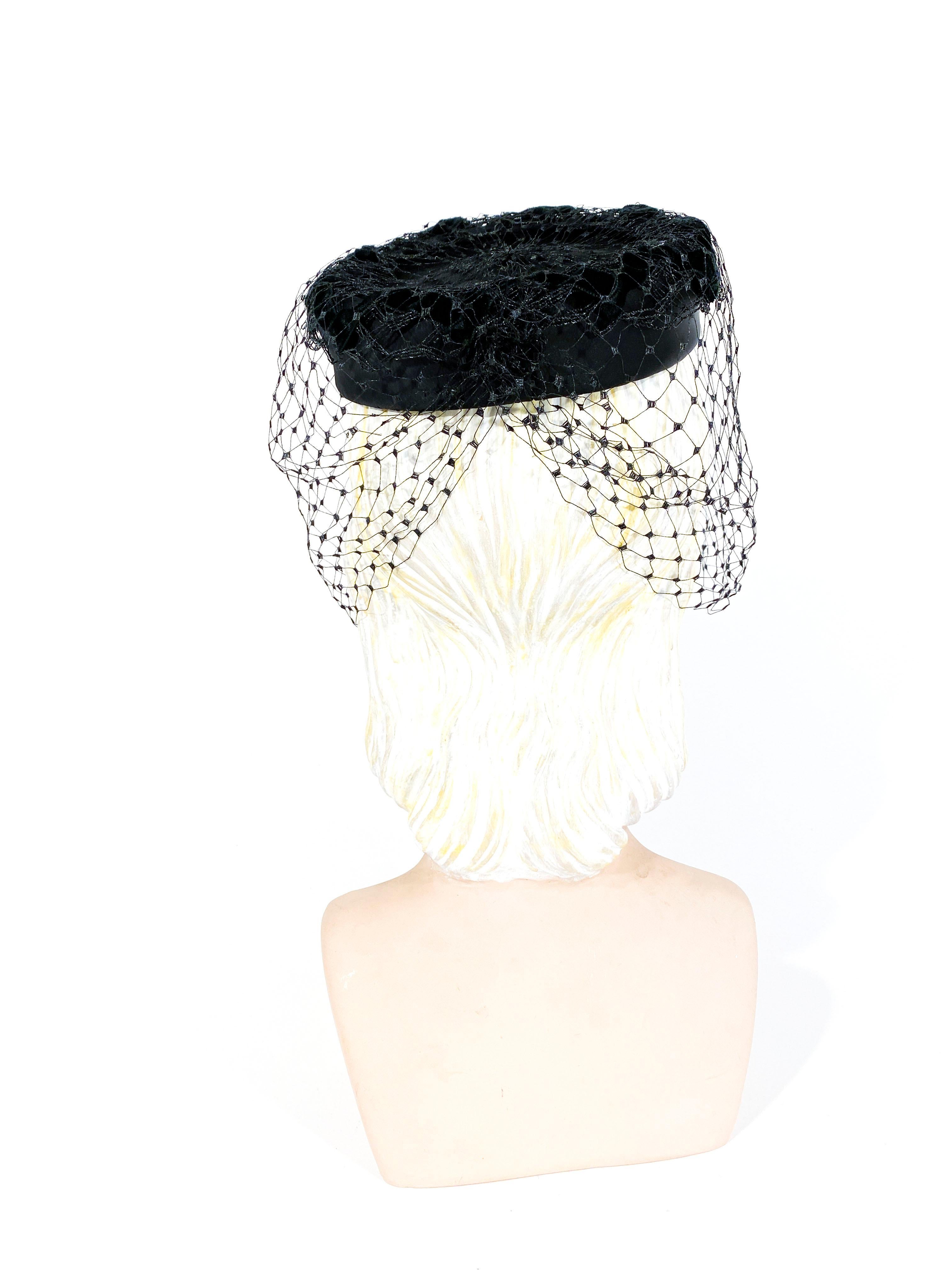1960s  Black Satin Pillbox Hat with Veil and Velvet Ribbon Accent In Good Condition In San Francisco, CA