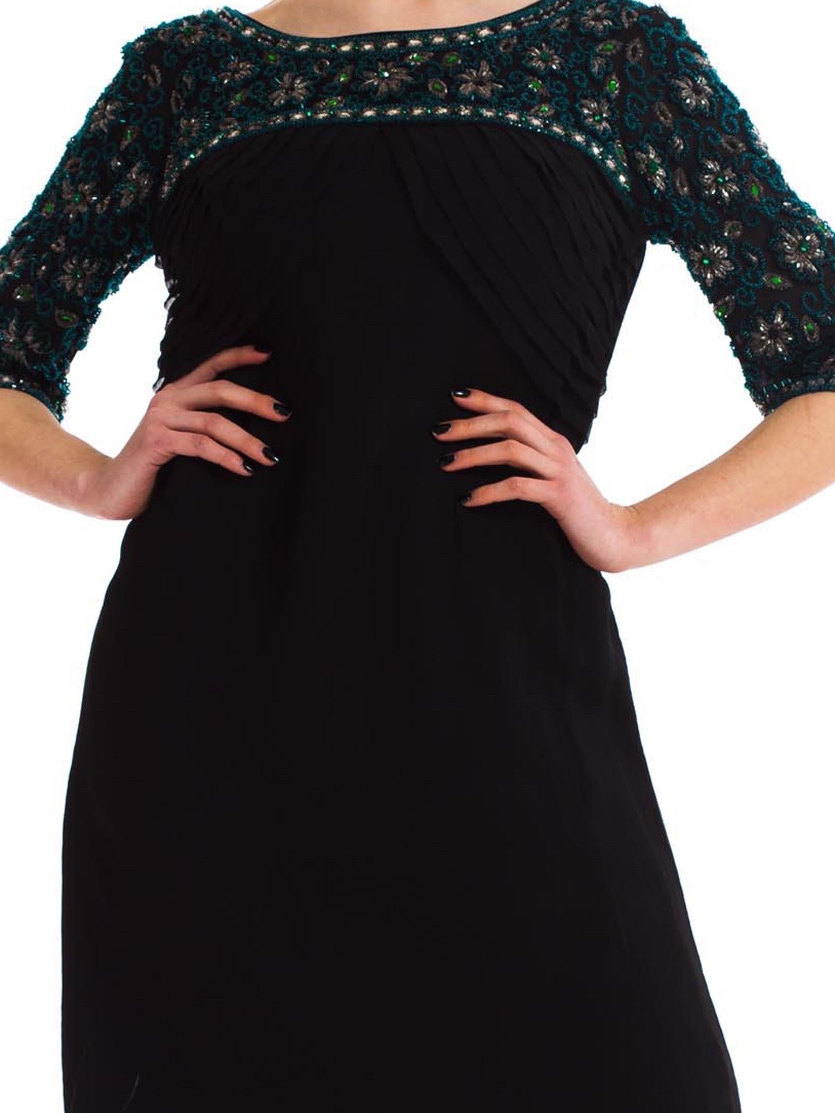 1960S Black Silk Mousseline Cocktail Dress With Emerald Crystal Beaded Sleeves For Sale 1
