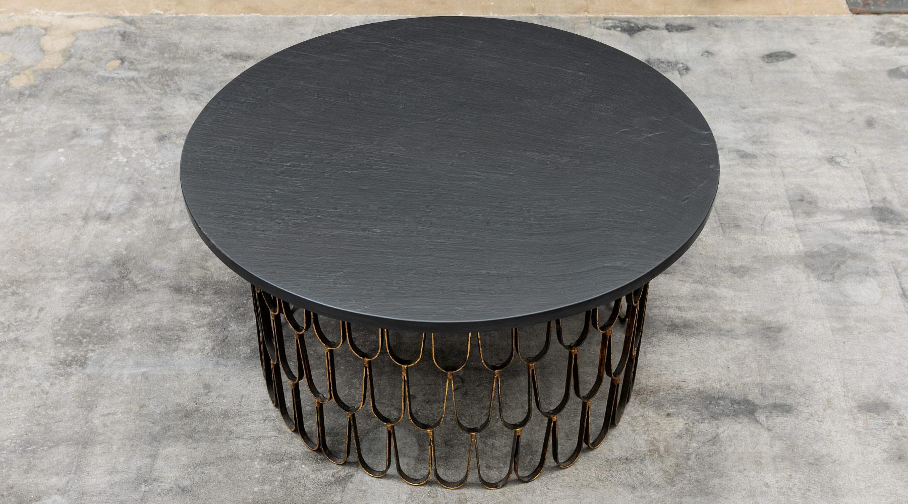 Coffee table, gilt and enameled steel, slate, giltwood, by Paul Evans and Phillip Lloyd Powell, USA, 1960.

A wonderful, unique piece, finished with three different materials: gilded and enamelled steel, slate, gilded wood. Manufactured by Paul