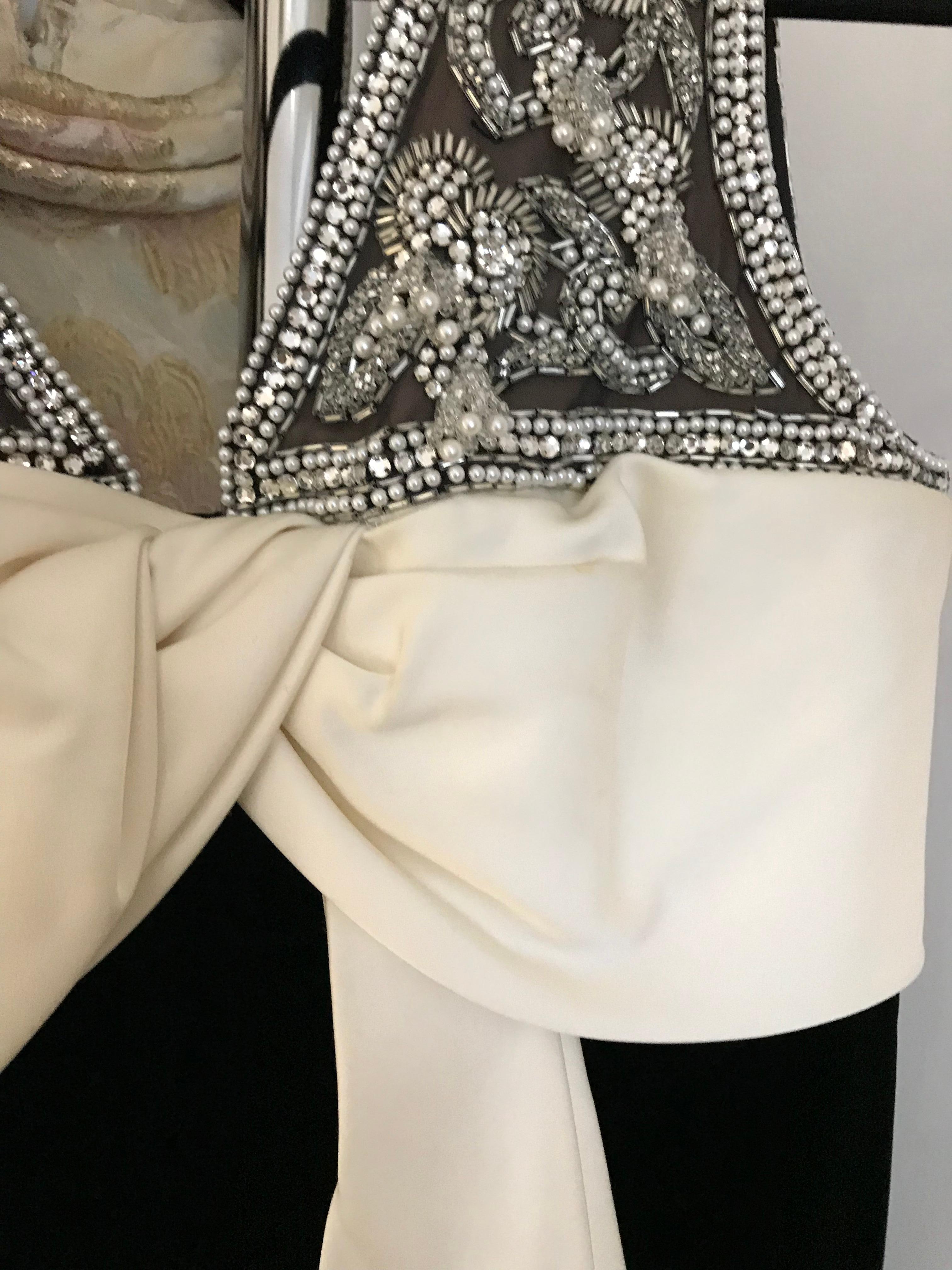 1960s Black Velvet Sleeveless Gown With Creme Silk Bow 1