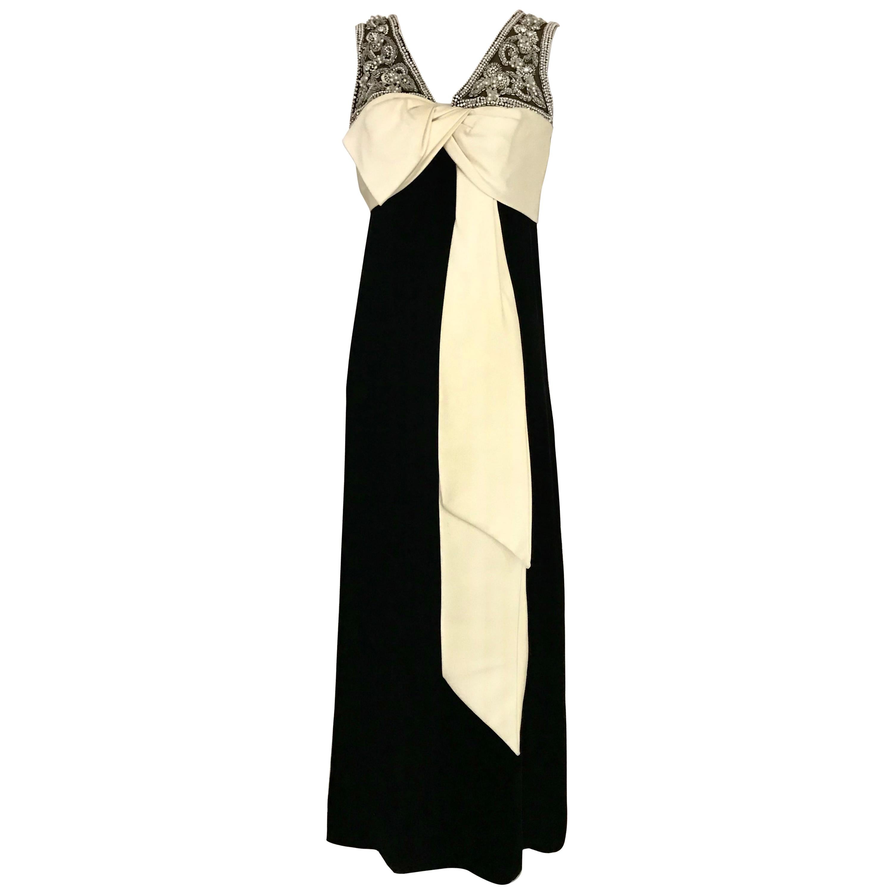 1960s Black Velvet Sleeveless Gown With Creme Silk Bow
