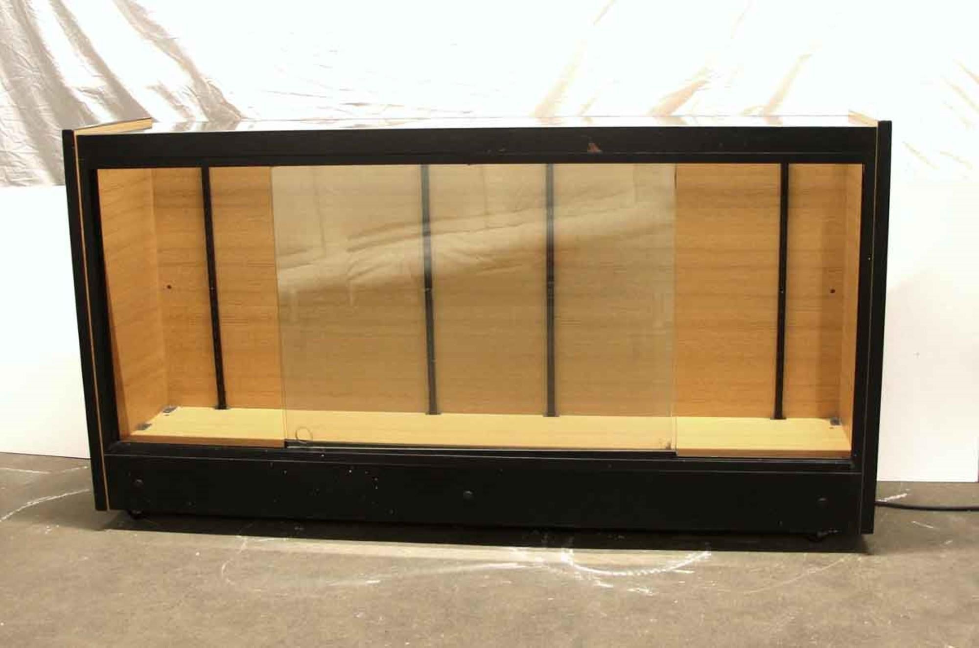 1960s Black Wood Showcase with Front Sliding Doors and Glass Top at