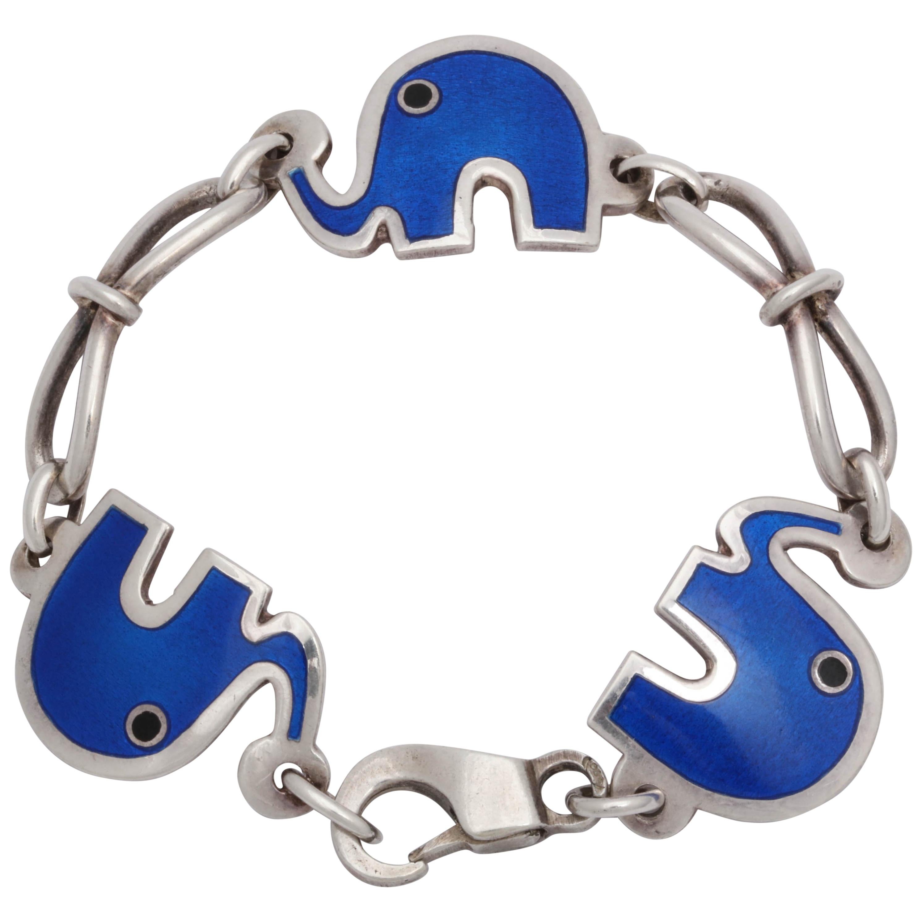 1960s Blue and Black Enamel Figural and Whimisical Elephant Sterling Bracelet For Sale